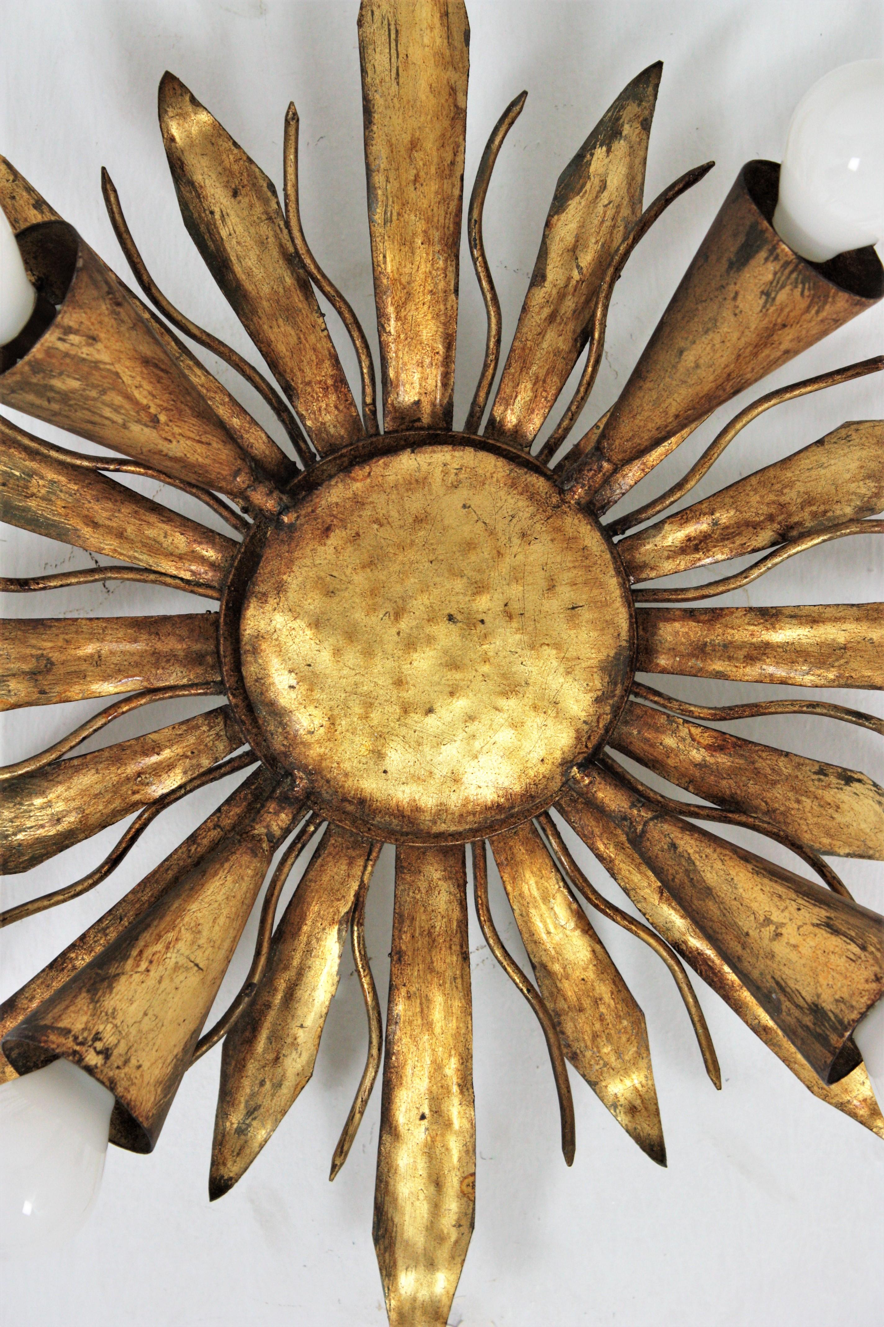 Hand-Crafted 1940s French Sunburst Foliage Flush Mount Light Fixture in Gilt Iron For Sale