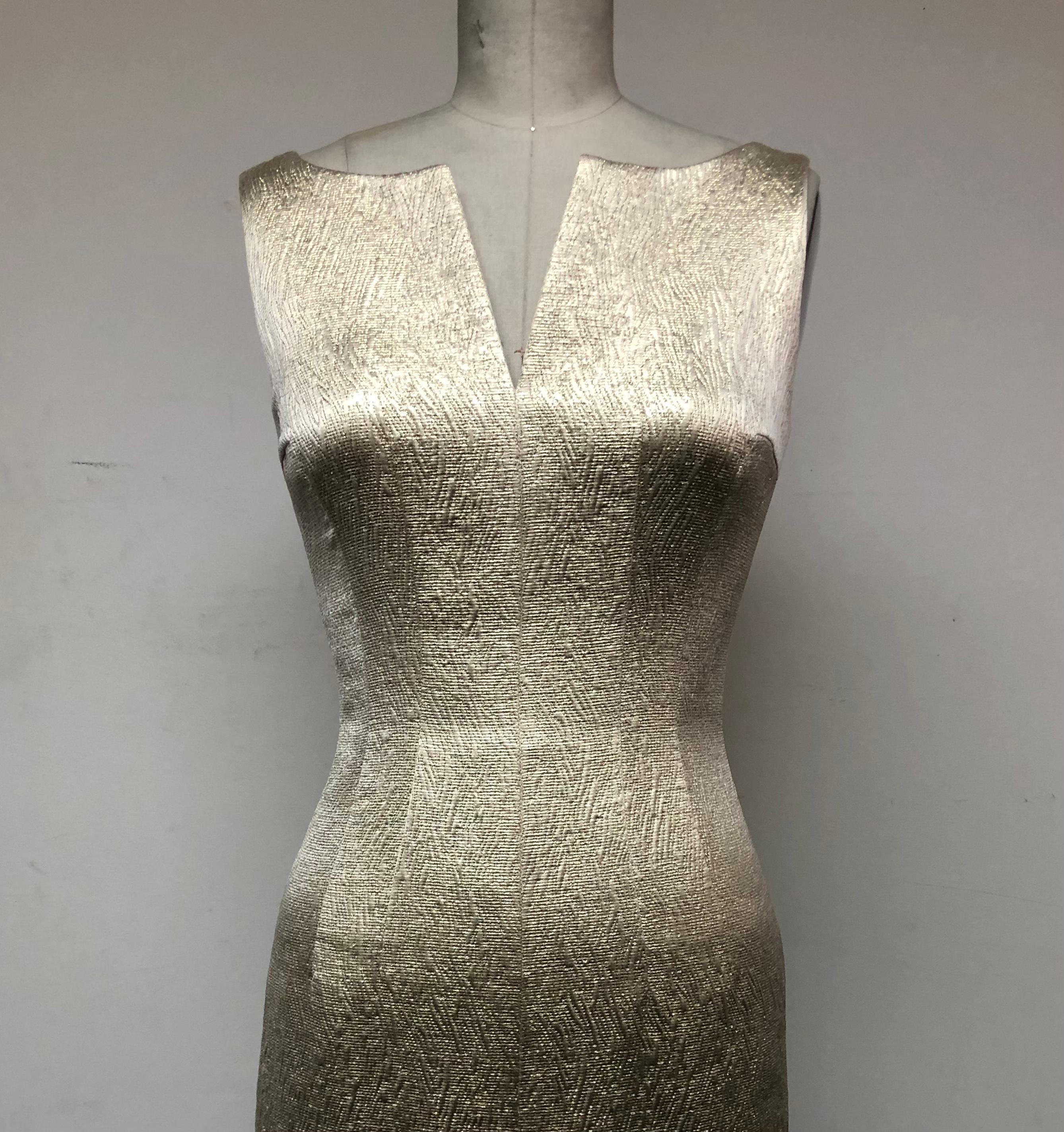 Classic timeless Hollywood! Woven gold French brocade column gown with split bodice and front slit. Fully silk-lined, this comfortable and elegant dress fits like a glove and has just the right amount of shimmer. Strikingly sensual, its double front