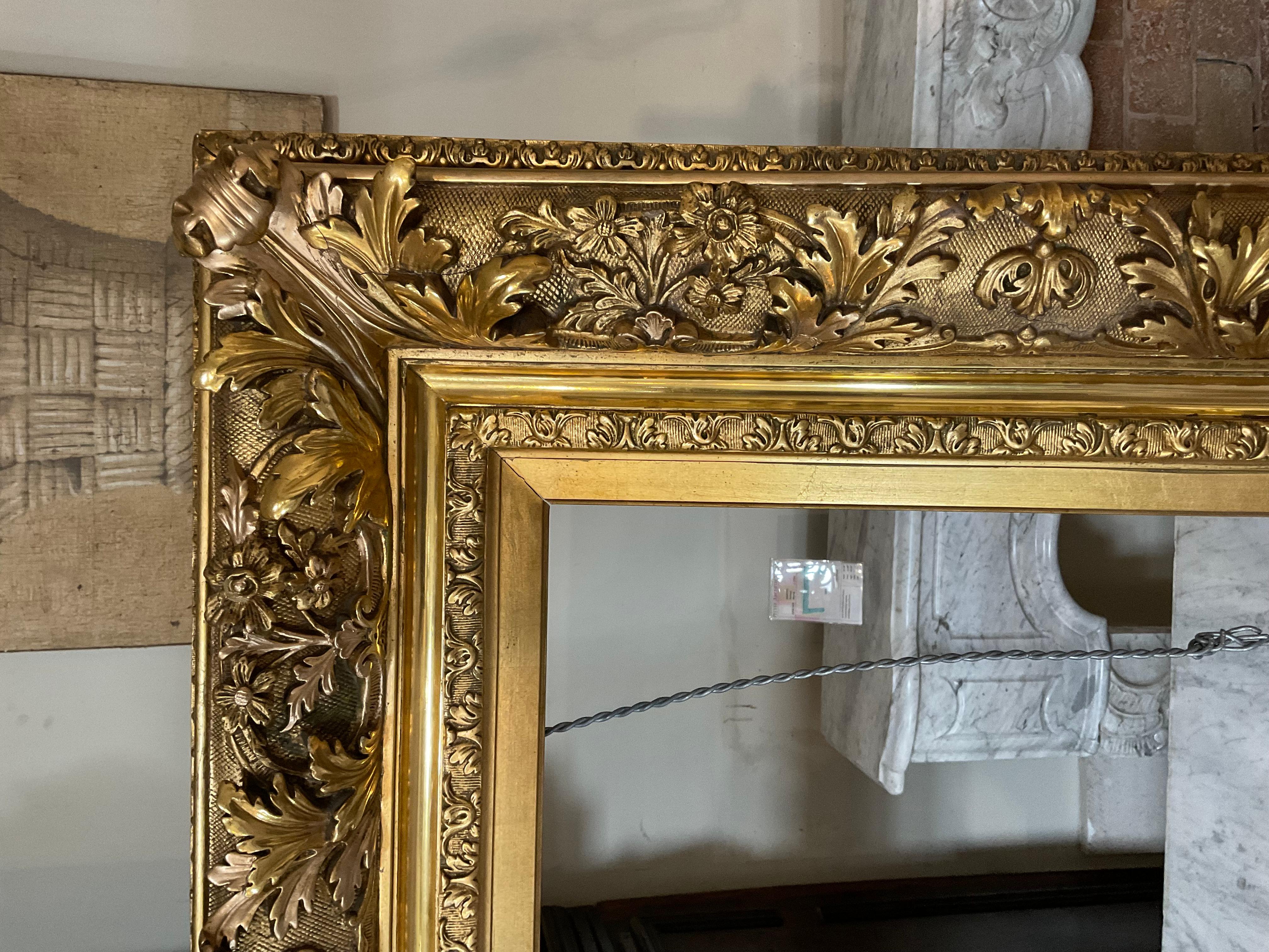 This exquisite French Gold Leaf Frame is a masterpiece of craftsmanship, dating back to the 1870s. Beautifully carved detailing adorns the edges, and its sturdy back wiring support makes it perfect for wall mounting. Perfect solution for art,