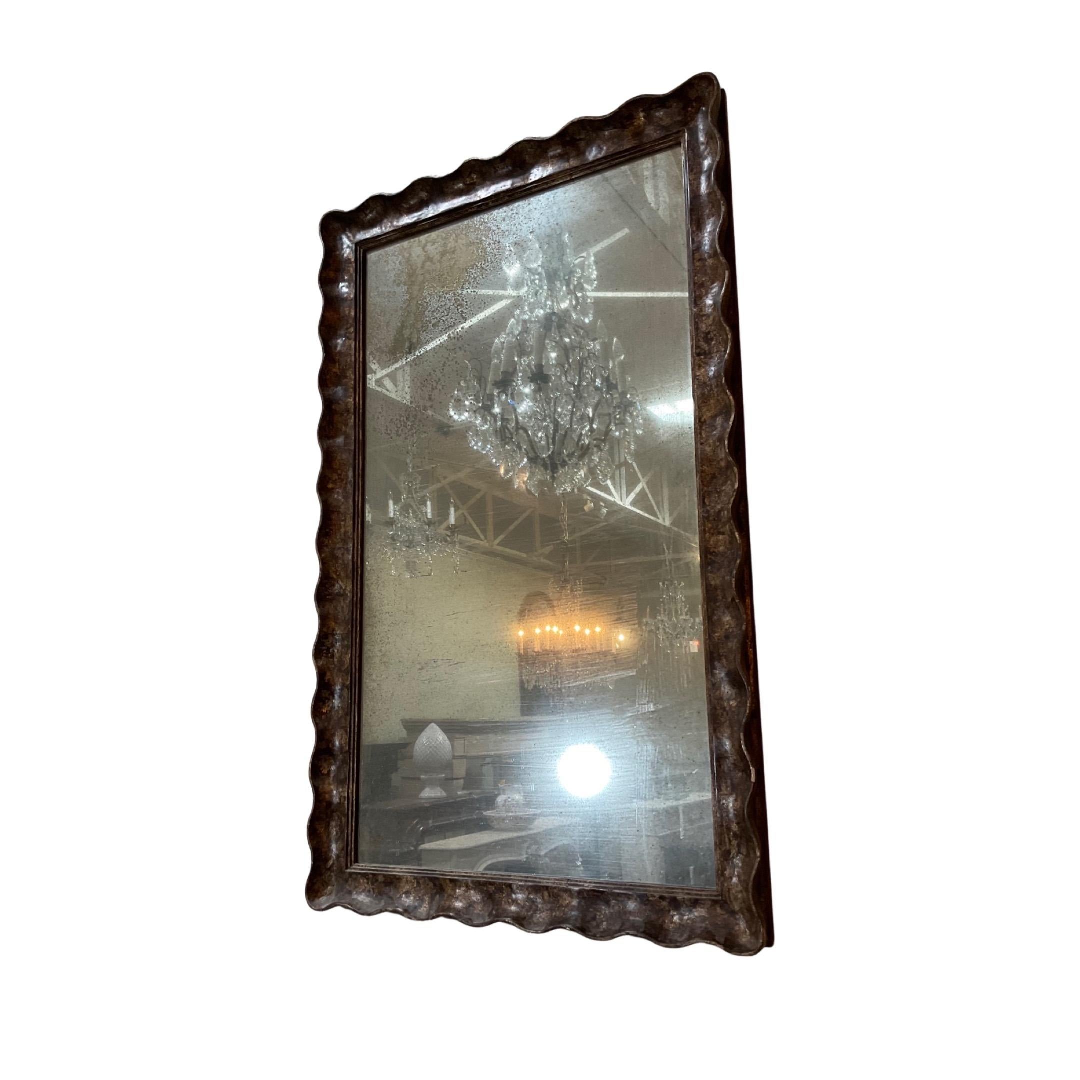 This elegant French gold leaf mirror from Italy is perfect for contemporary and antique décor. Crafted with a golden leaf finish, it is sure to add a sophisticated touch to your home.