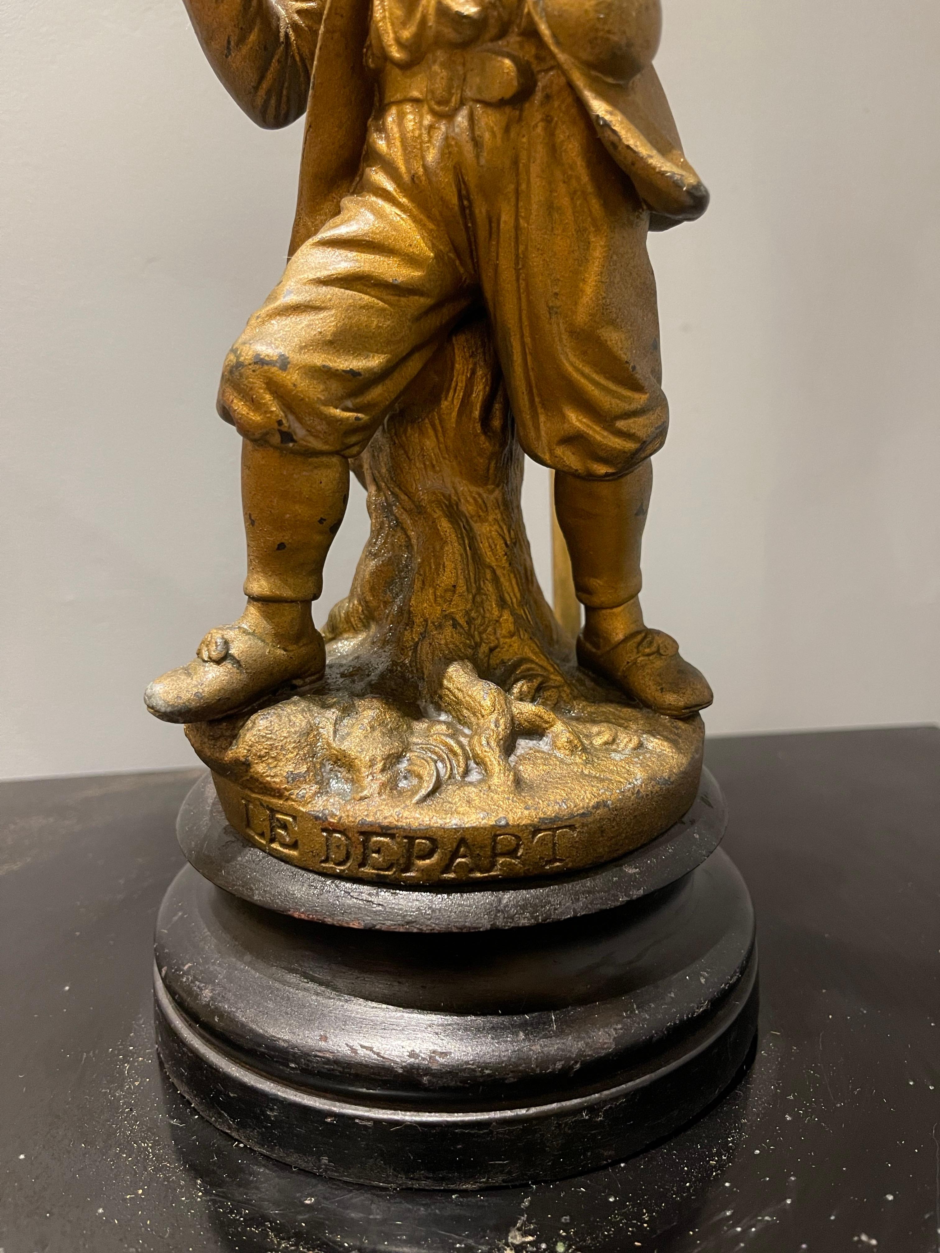 Figura di uomo in partenza in metallo dorato francese 