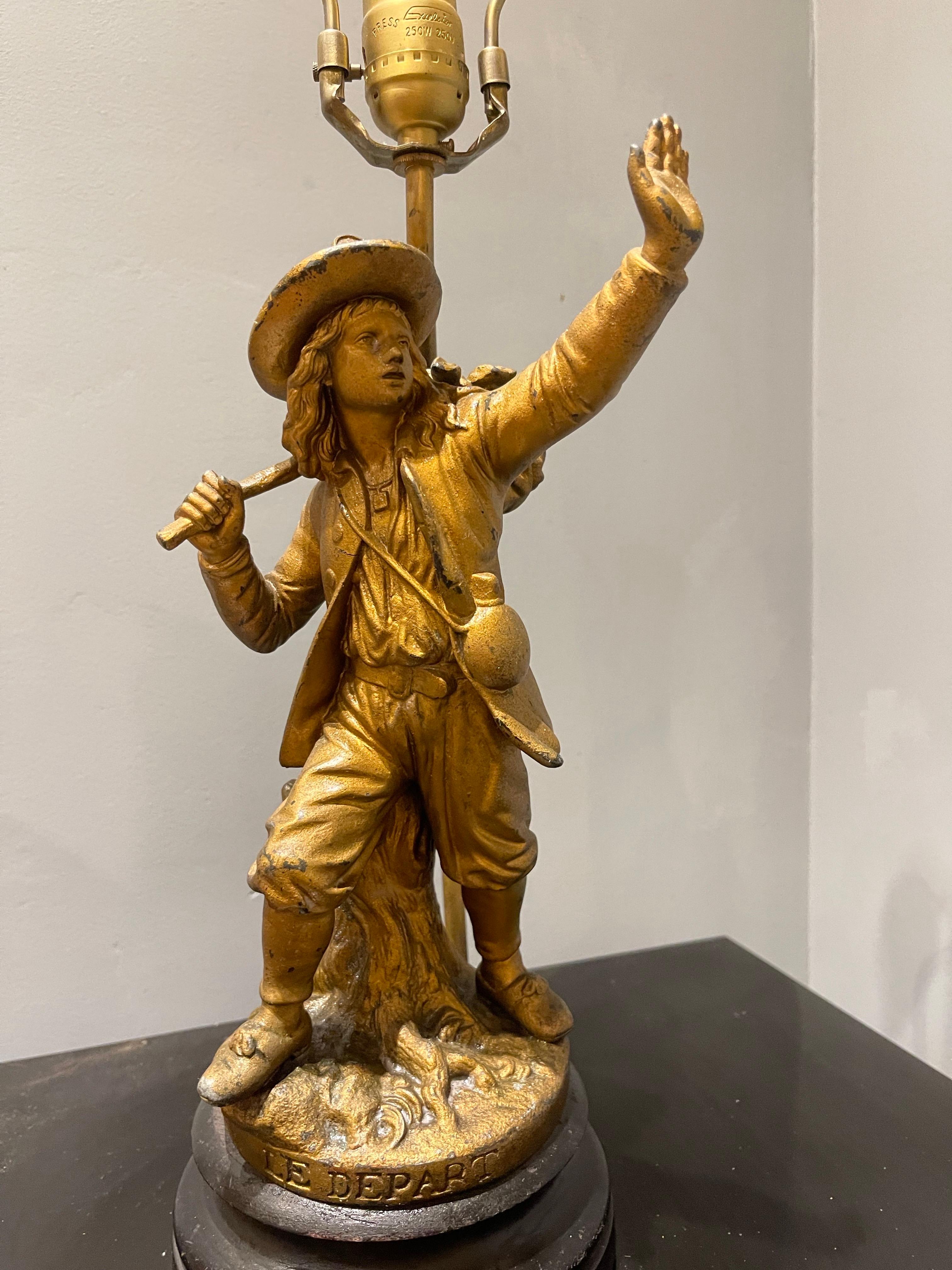 Figura di uomo in partenza in metallo dorato francese 