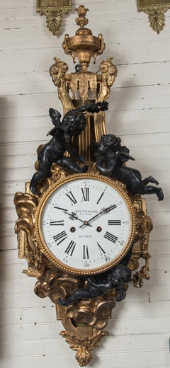 French Gold Psainted and Dark Bronze Cartel Clock