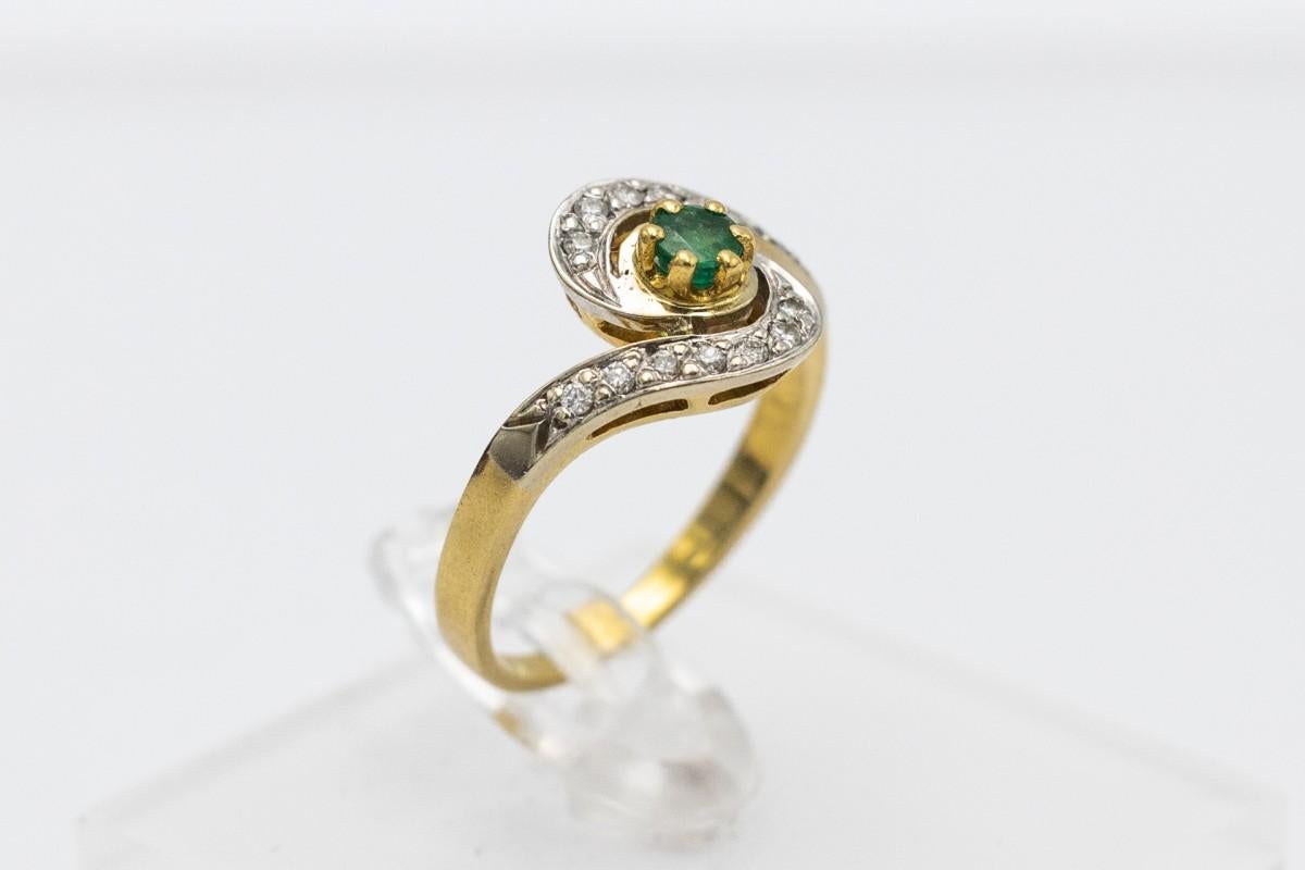 French gold ring with diamonds and emerald, 1960s. 1