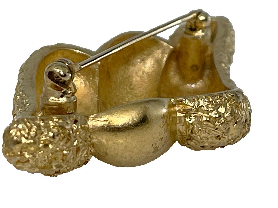 Gold Plate French gold tone brooch by Nina Ricci, 1980s For Sale