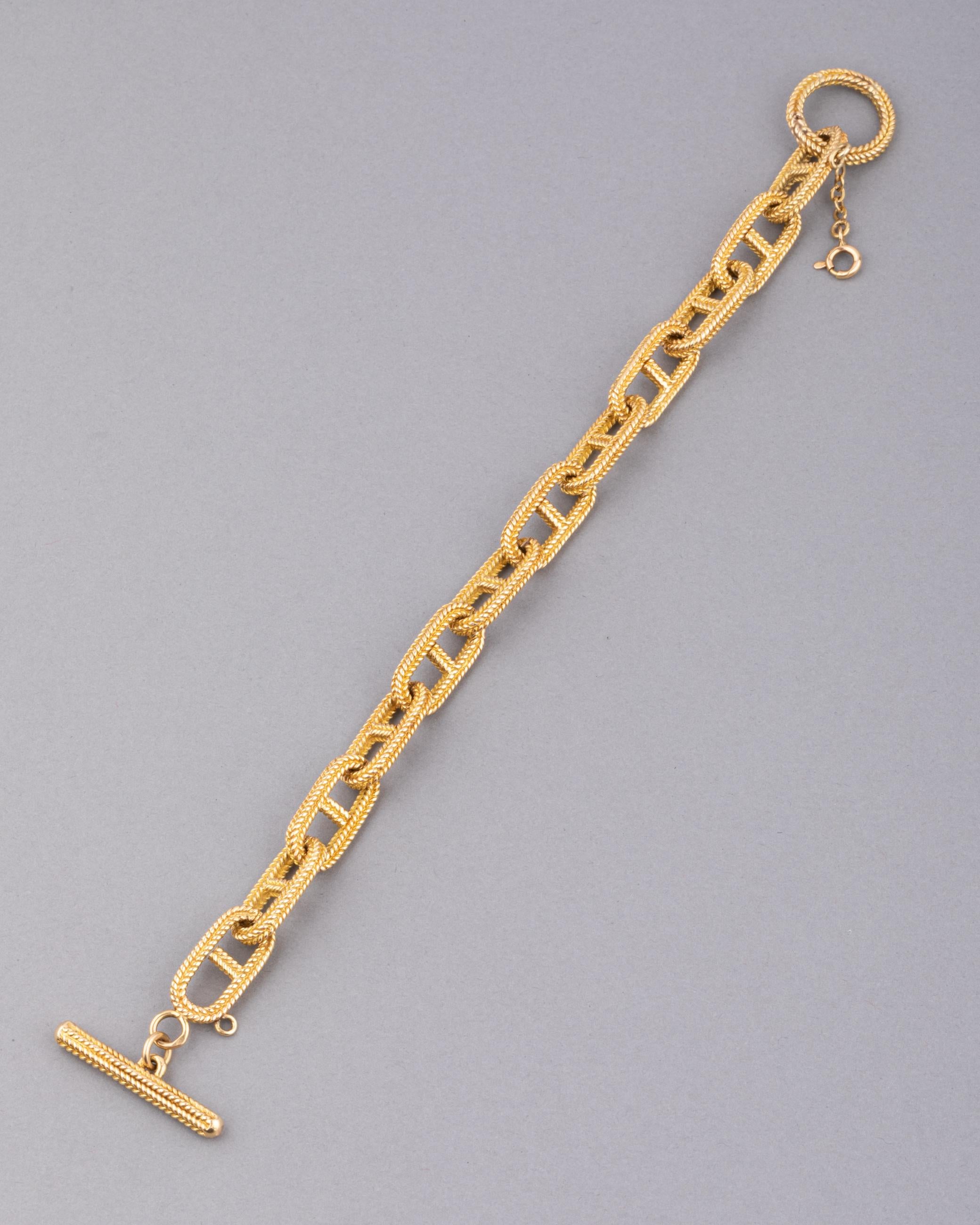 Ein schönes Vintage-Armband.
Hergestellt aus 18 Karat Gold, französische Punze: die Eule.
Durchschnittliche/bequeme Größe: 18cm.
47.68 Gramm. Jedes Glied misst 20*10 mm.