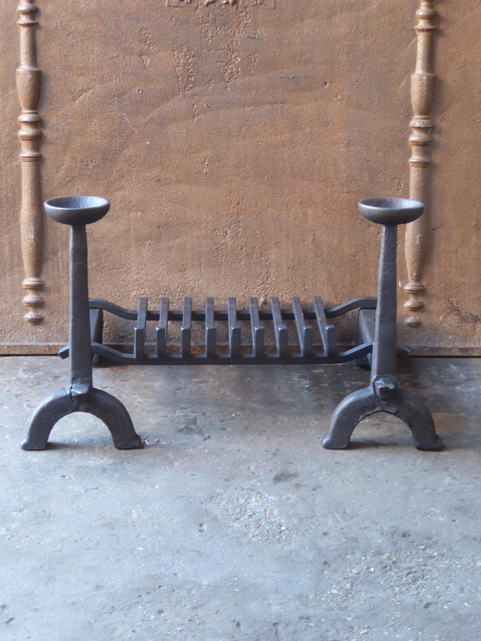 17th century French Gothic fire grate. Made of cast iron and wrought iron. The condition is good.







  