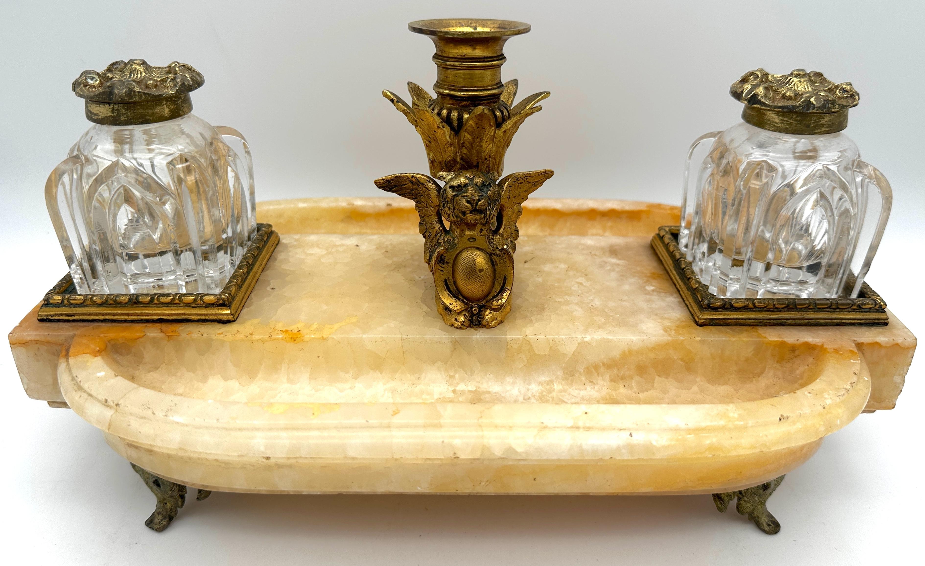 French Gothic Ormolu Cut Glass and Marble/Quartz Double Inkwell
France, circa 1870s

A magnificent French Gothic Ormolu Cut Glass and Marble/Quartz Double Inkwell, dating back to the 1870s. This exquisite piece exemplifies the elegance and