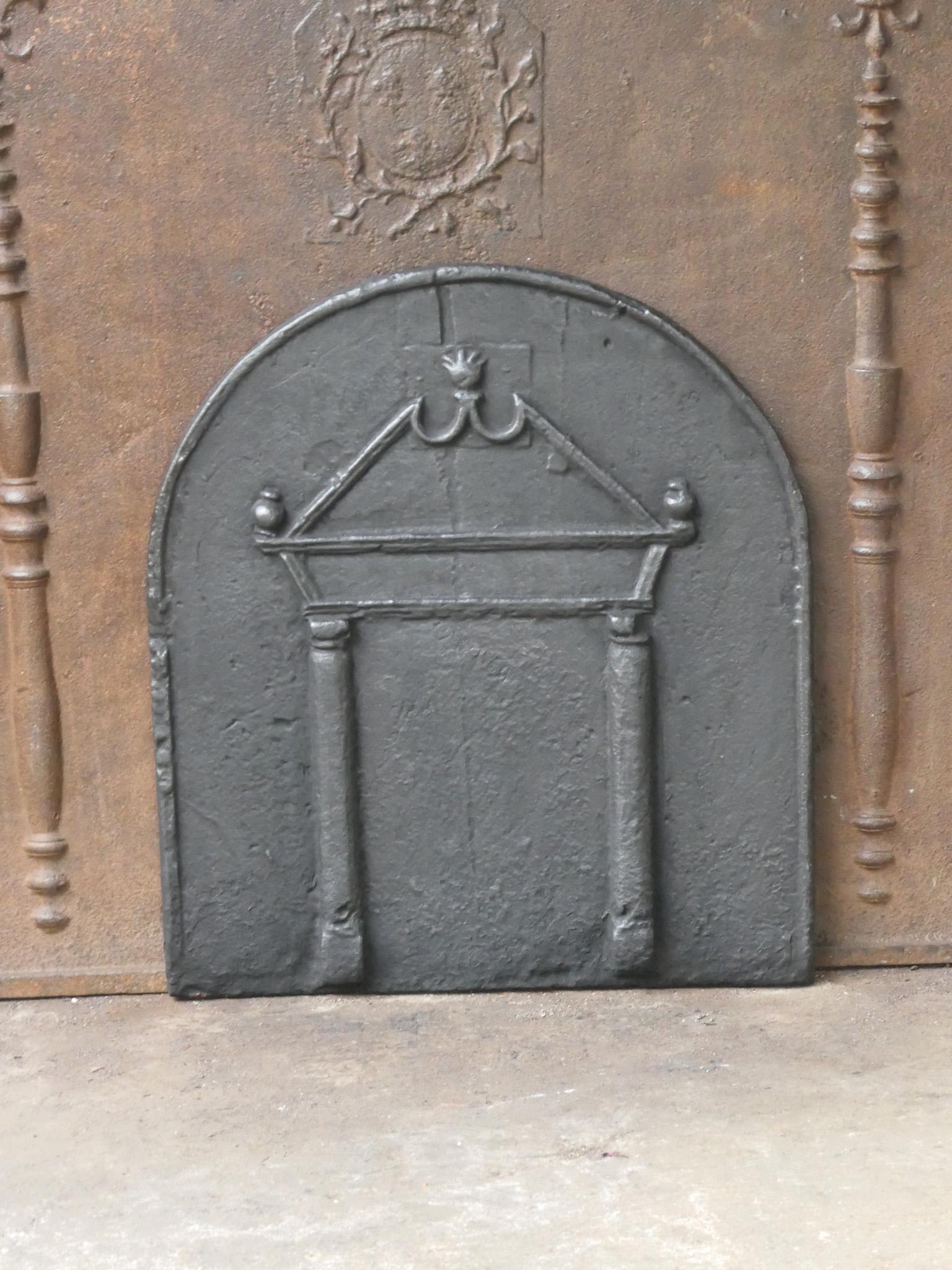 17th century French Gothic fireback with two pillars of Hercules and a pediment.

The pillar refers to the club of Hercules, his favorite weapon. It symbolizes power. Since antiquity the ‘Pillars of Hercules’ are also the name of the promontories at