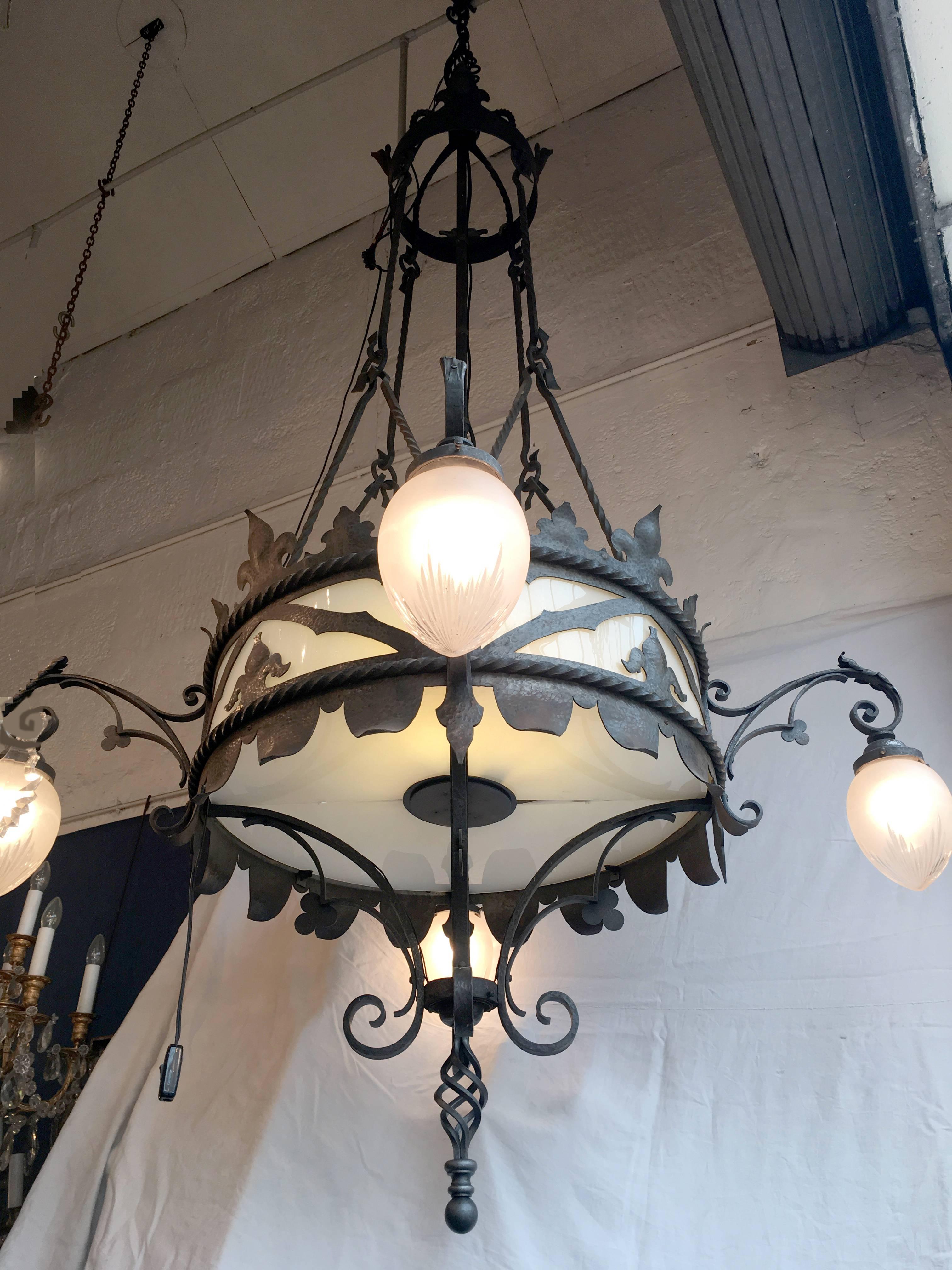 Large set of French Gothic Wrought Iron Chandeliers For Sale 1