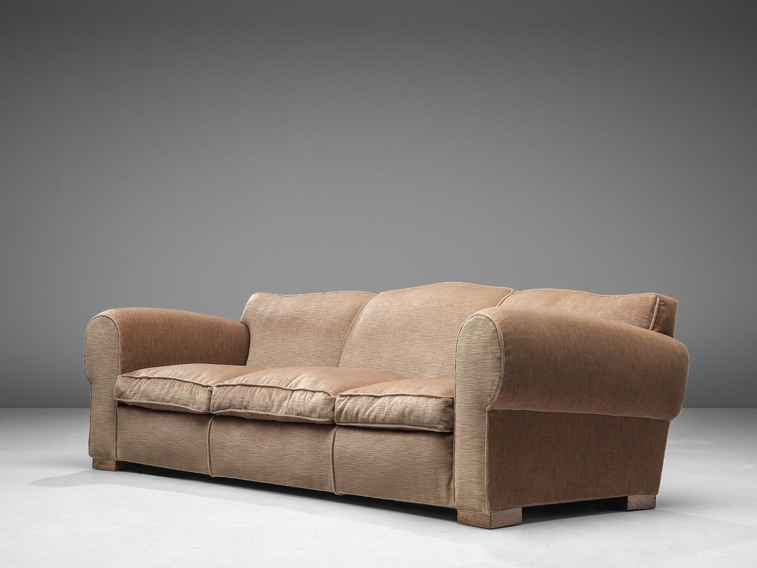 Maurice Rinck, sofa, velvet and oak, France, 1940s

Grand and comfortable three-seat sofa in taupe velvet upholstery. Truly extraordinary luxurious sofa that features a deep seat and large rounded, curved armrests. The backrest is noteworthy,