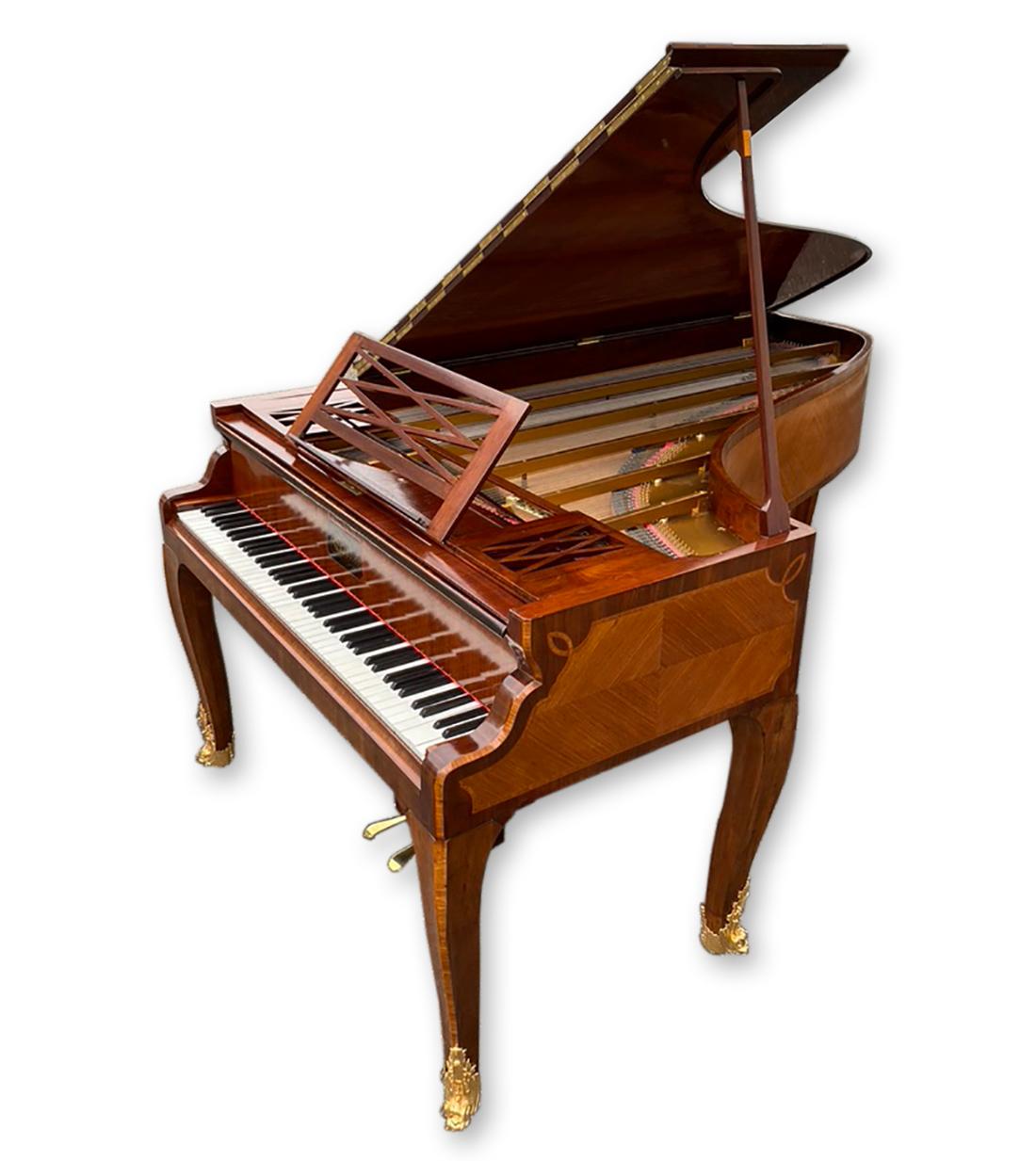 Art cased grand piano by Erard Paris
Serial number 19924 
Case Paris 1877
Designed by Mercier Frères Paris with a design specified by order.
Restored to perfection by our German piano master team. For stable tuning, the pinblock has been