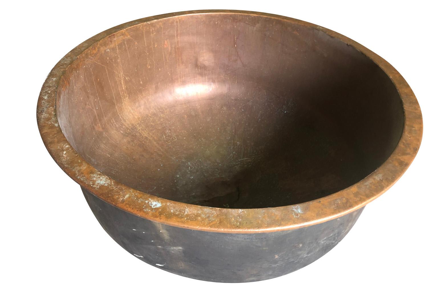 An outstanding and very grand scale Vat - Kettle - wonderfully crafted from very heavy gauge copper.  Vats such as this one were originally used in cheese making.  A sensational piece for any garden - whether converted into a water feature, a large