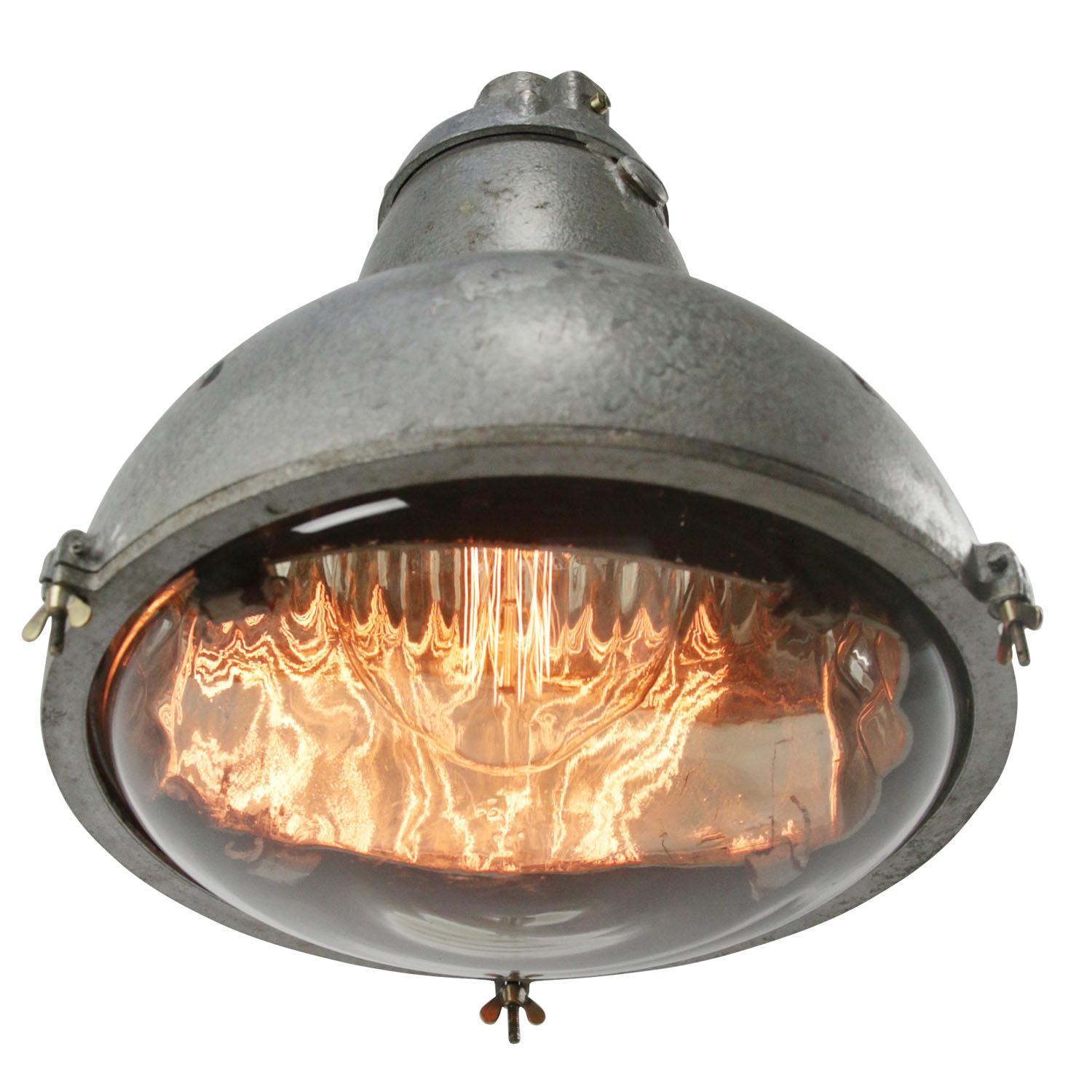 Rare French factory light
cast aluminium with clear round glass
Mercury glass mirror inside

Weight: 5.90 kg / 13 lb

Priced per individual item. All lamps have been made suitable by international standards for incandescent light bulbs,
