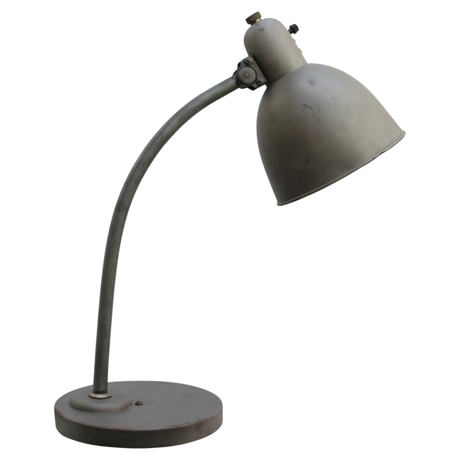 Grey metal desk light
2.5 meter black cotton flex, plug and switch in shade

Also available with US/UK plug

Weight: 1.90 kg / 4.2 lb

Priced per individual item. All lamps have been made suitable by international standards for incandescent light