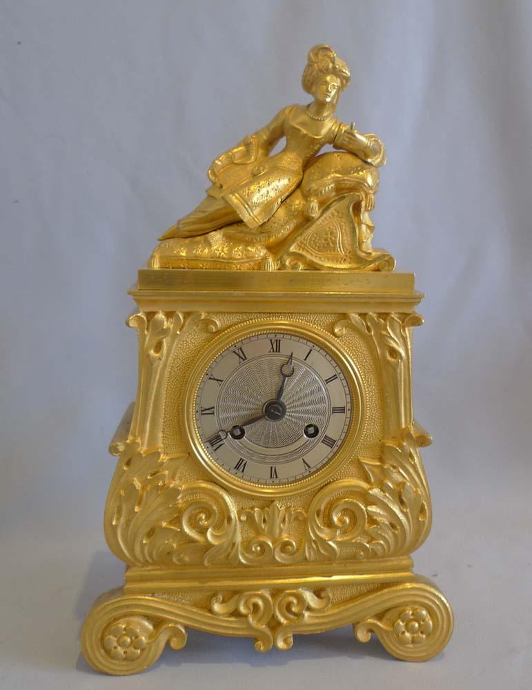 French Charles X period Greek Revolution or Hellenistic mantel clock. The clock in original ormolu with a Turkish figure to the top. The silvered dial has fine original blued steel hands of Breguet moon form. The movement is of 8 day duration,