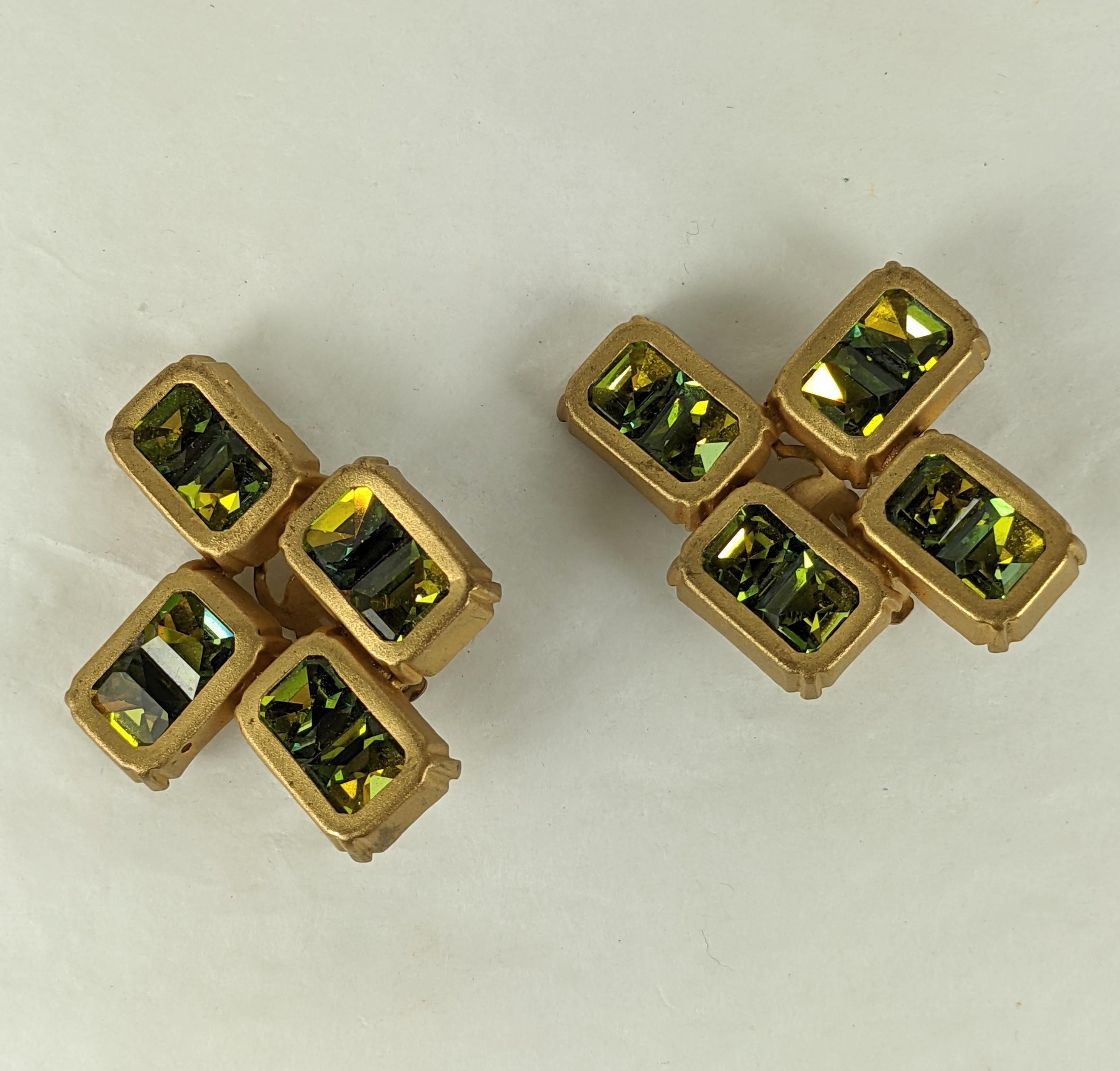 French Green Aurora Earrings from the 1980's. Emerald cut aurora pastes are used in gilt settings to create a geometric form ear clip.  1.75