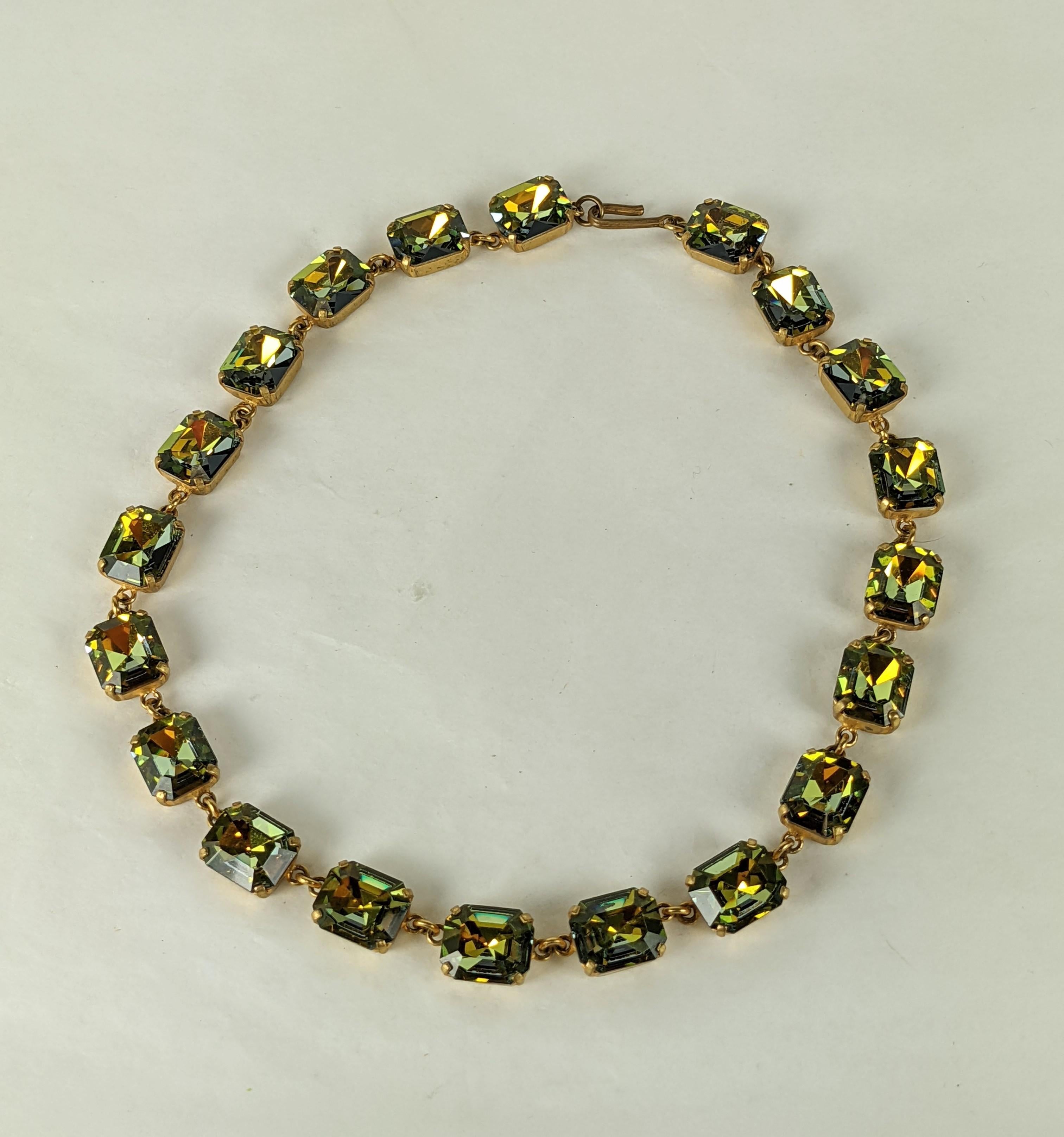 French Green Aurora Stone Necklace from the 1960's. Unusual green aurora emerald cut stones are used simply for a cool splash of color. France 1960's.  14.5
