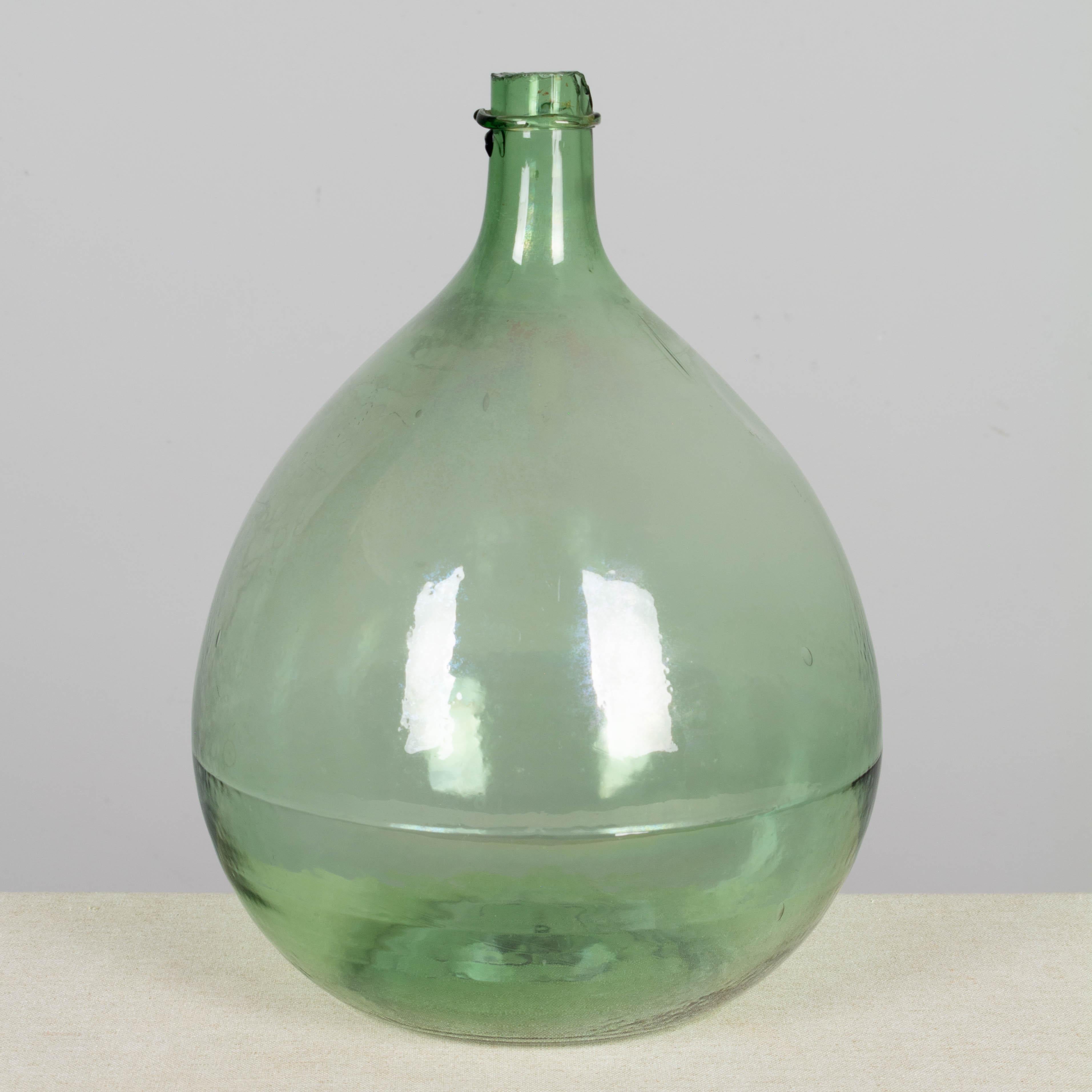 Botella garrafón de vidrio soplado verde francés Francés