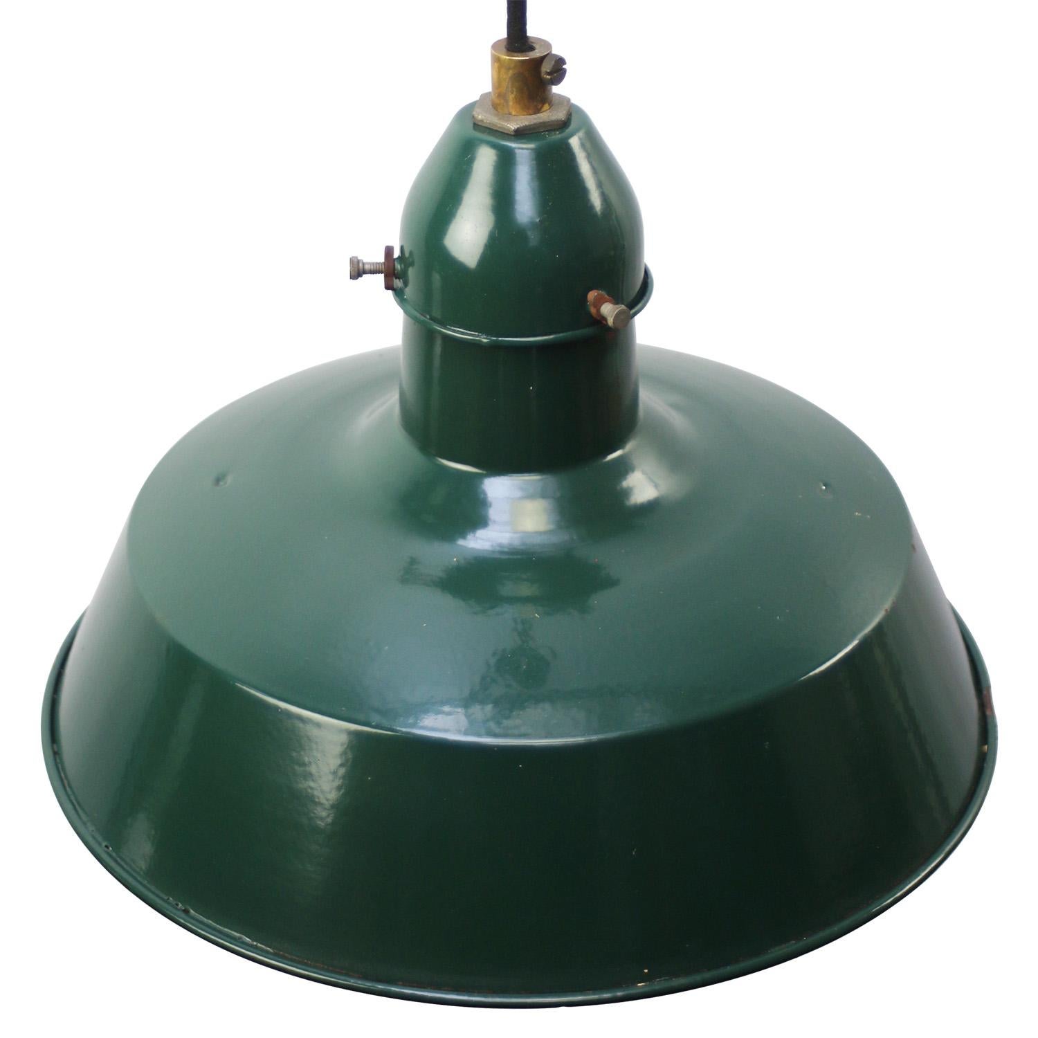 French factory pendant by Sammode, France
dark petrol green enamel white interior
Brass top

Weight: 1.30 kg / 2.9 lb

Priced per individual item. All lamps have been made suitable by international standards for incandescent light bulbs,