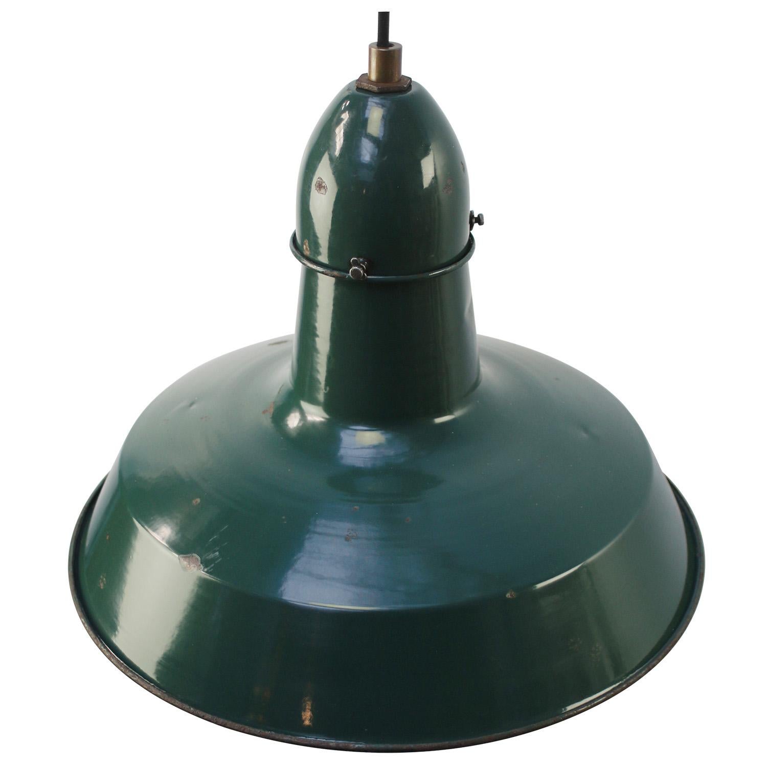 French factory pendant by Sammode, France
dark petrol green enamel white interior
Brass top

Weight: 2.10 kg / 4.6 lb

Priced per individual item. All lamps have been made suitable by international standards for incandescent light bulbs,