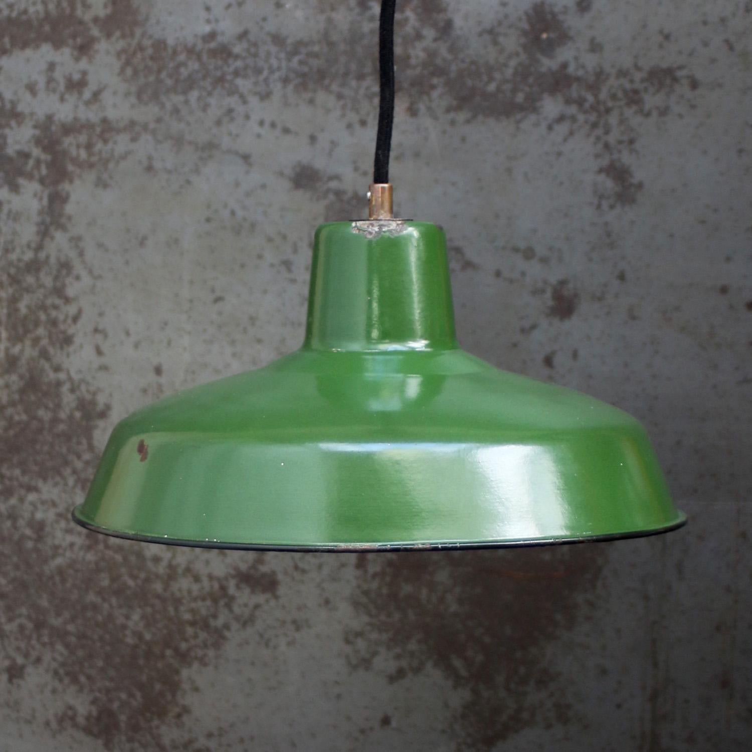 French factory pendant light
Green enamel, white interior

Weight: 1.00 kg / 2.2 lb

Priced per individual item. All lamps have been made suitable by international standards for incandescent light bulbs, energy-efficient and LED bulbs. E26/E27 bulb
