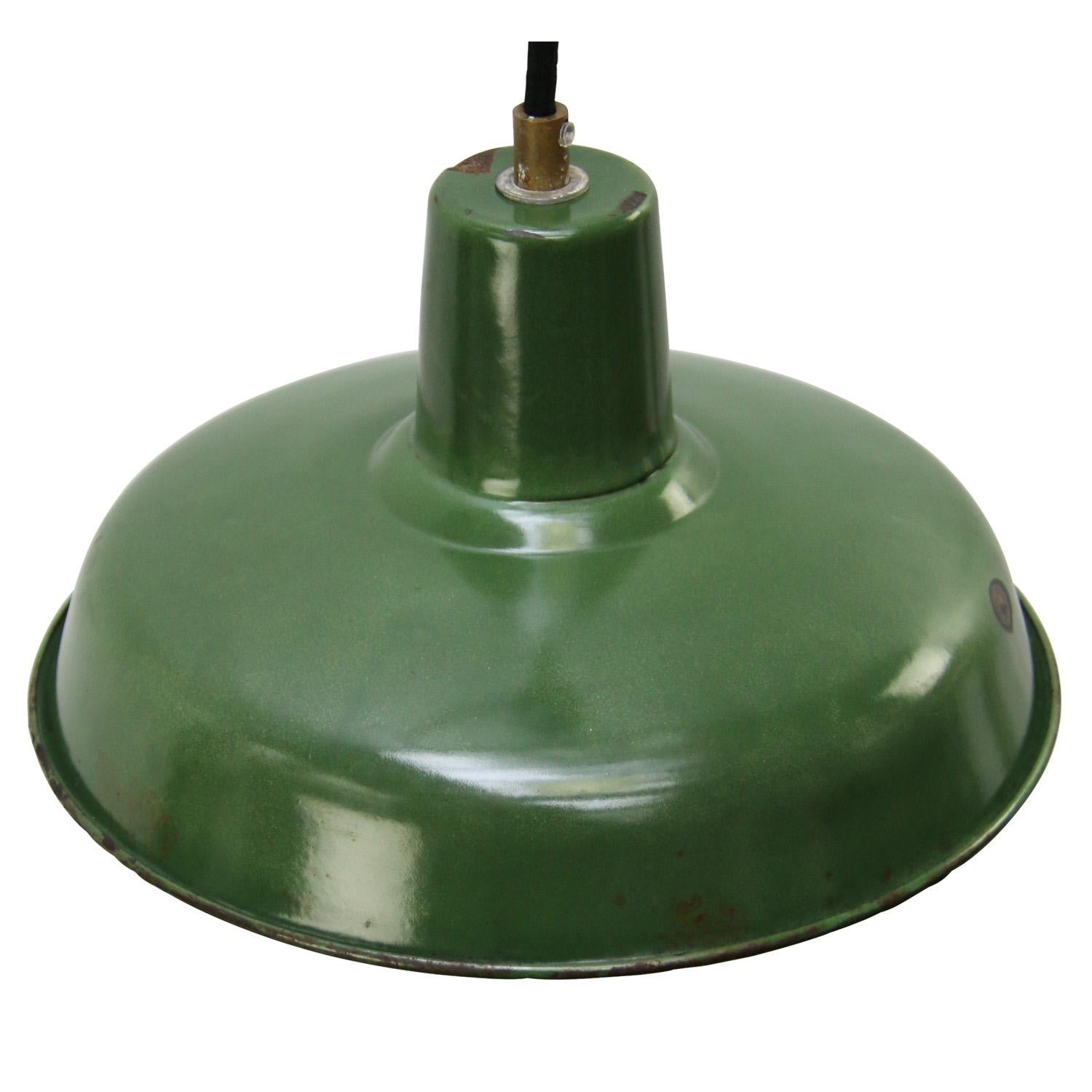 Small French factory pendant light
Green enamel, white interior

Weight: 1.00 kg / 2.2 lb

Priced per individual item. All lamps have been made suitable by international standards for incandescent light bulbs, energy-efficient and LED bulbs.