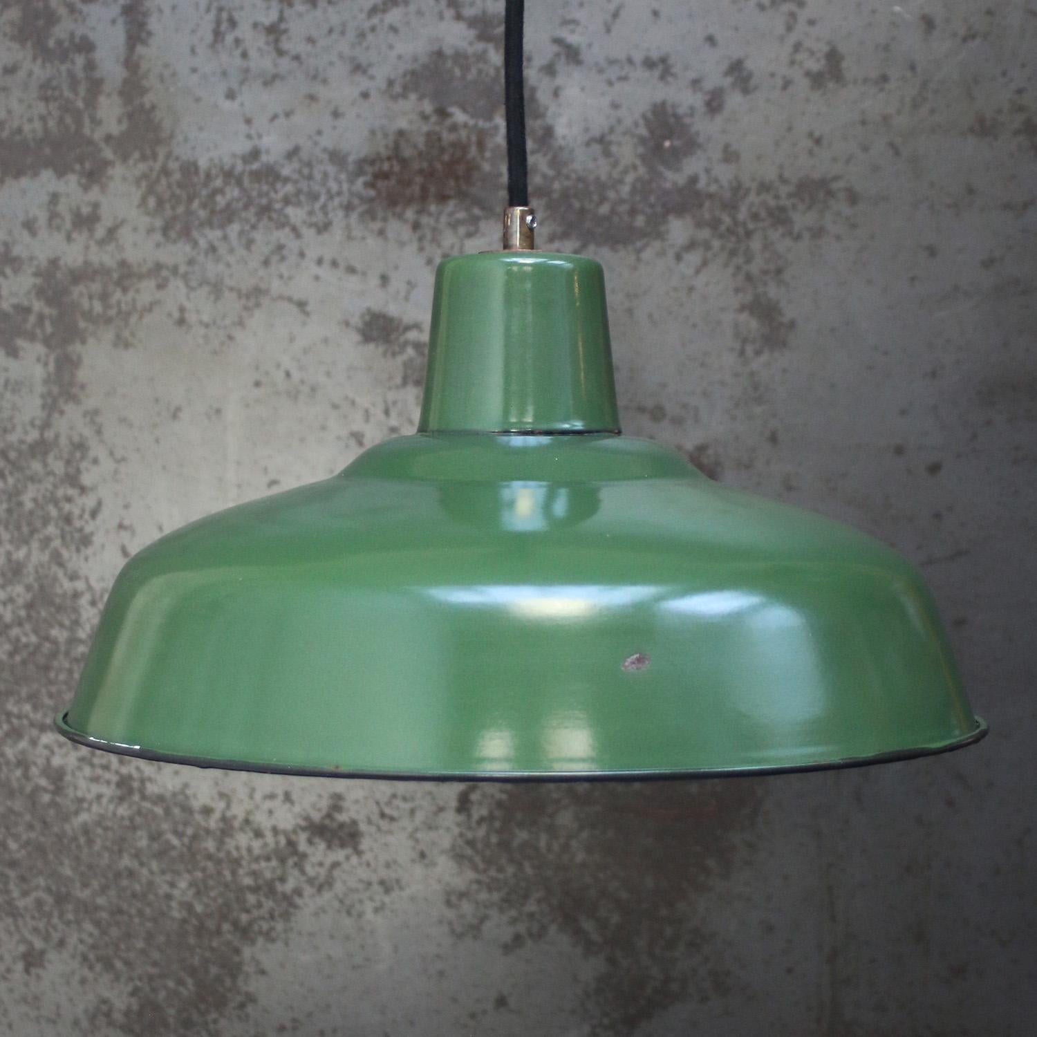 French green enamel pendant
white interior

Weight: 1.10 kg / 2.4 lb

Priced per individual item. All lamps have been made suitable by international standards for incandescent light bulbs, energy-efficient and LED bulbs. E26/E27 bulb holders and new