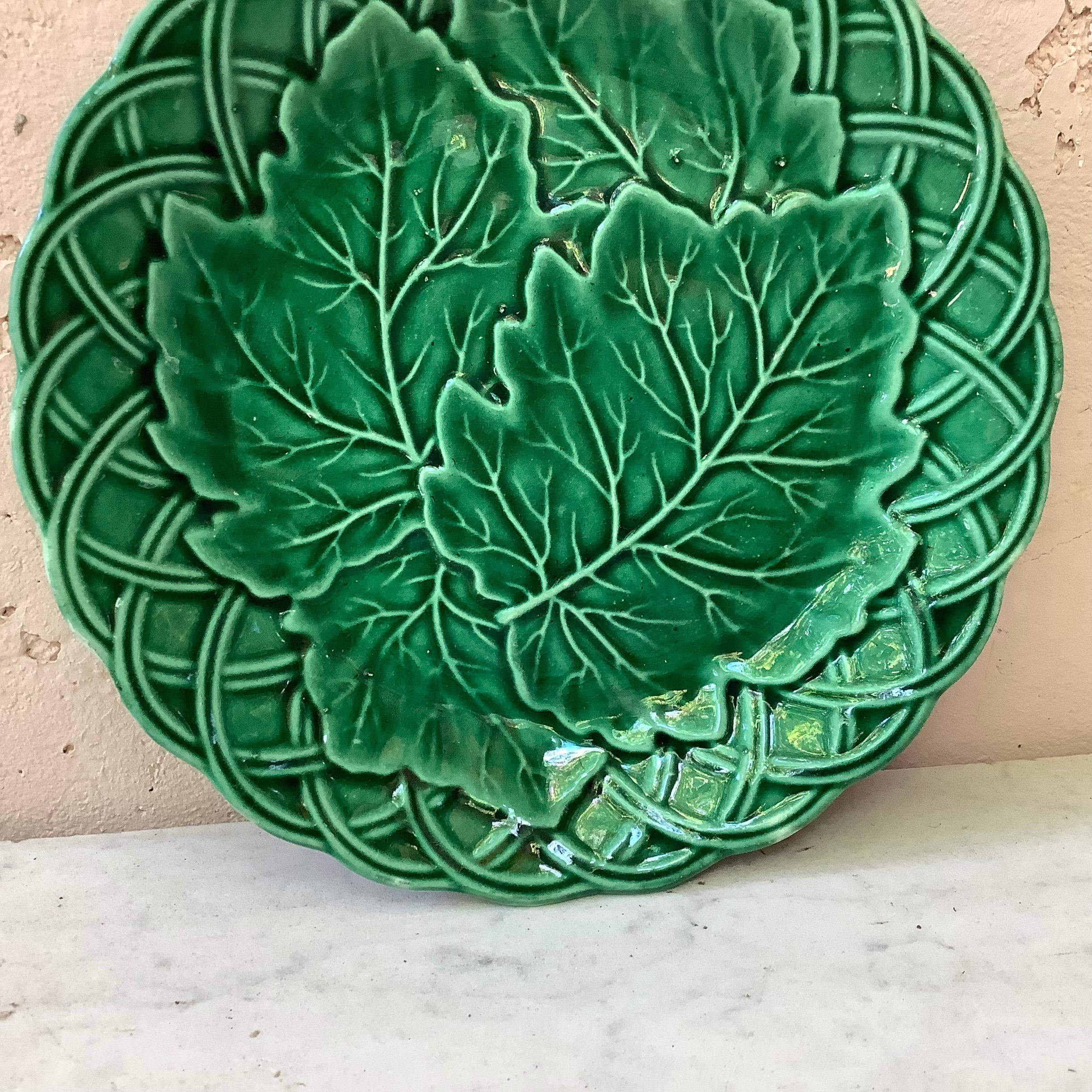French green Majolica leaves on basket weave background plate, circa 1880.