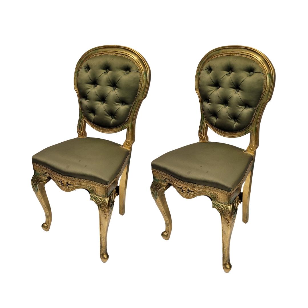Beautiful pair of chairs beginning of 20th century in the classic French Louis XV style. Carved and gilded wood with an aged effect. Seat and back upholstered in a dull but satiny olive green satin thanks to the effect of the fabric. Quilted