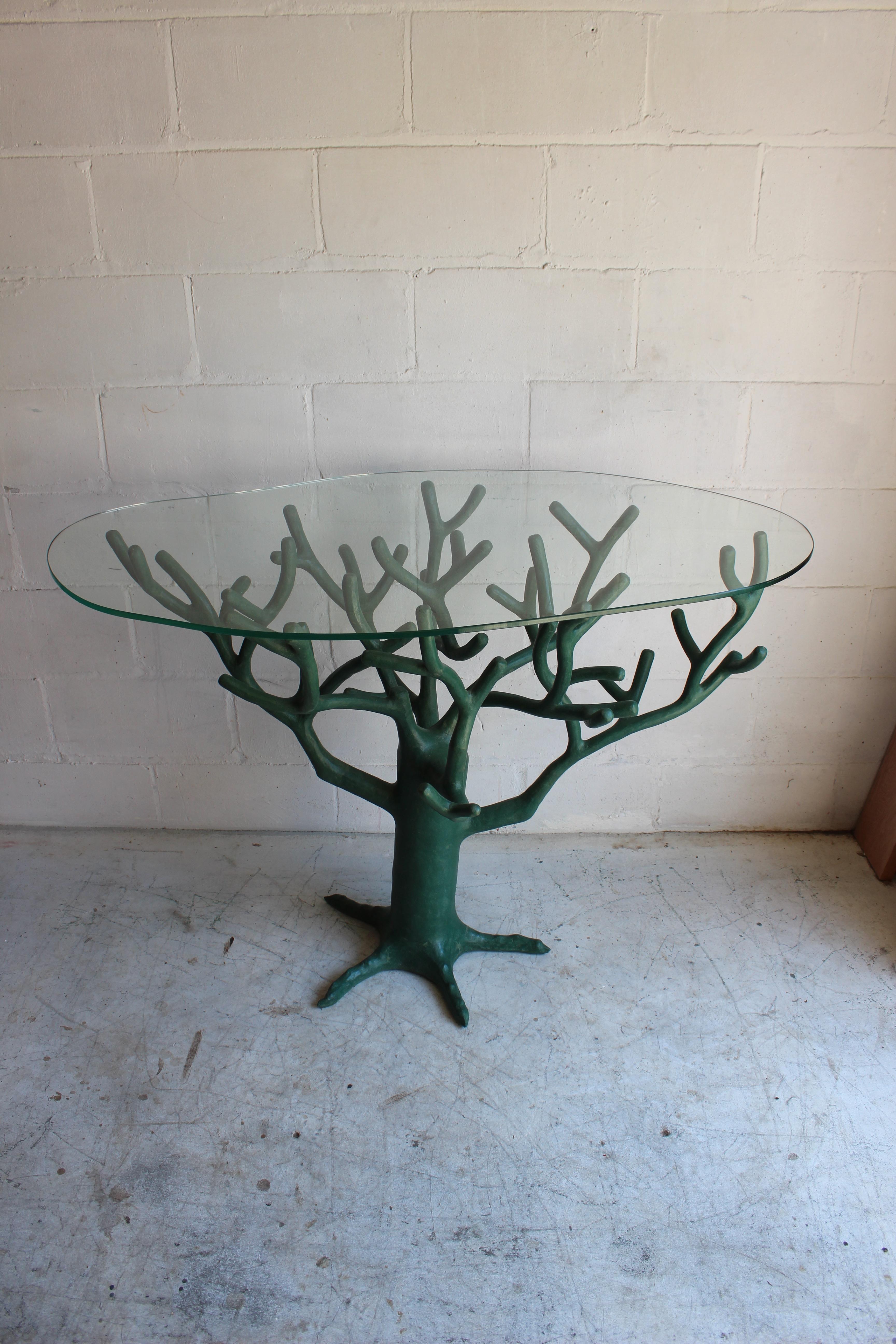 Whimsical and rare French green resin tree table with glass top.