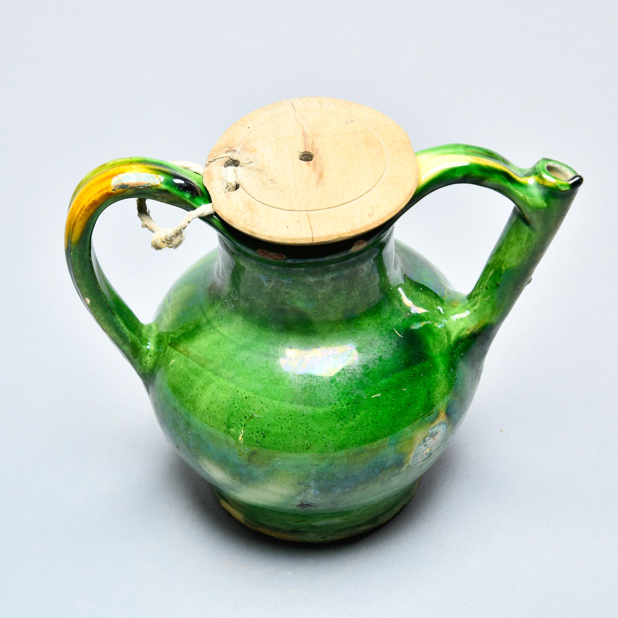 ceramic water jug with wooden lid