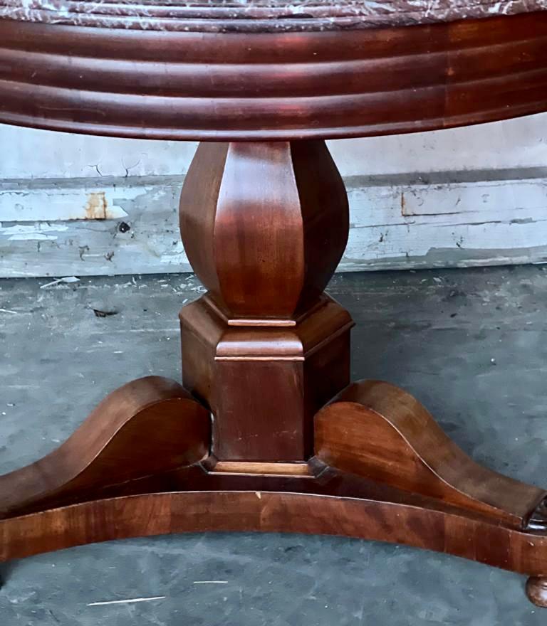 A very fine French Gueridon Centre Table with the highly desirable variegated Rouge Marble top and having the concentric grooves towards the edge. The base is made from Mahogany and it dates to the early 19th Century. 
This lovely table is in