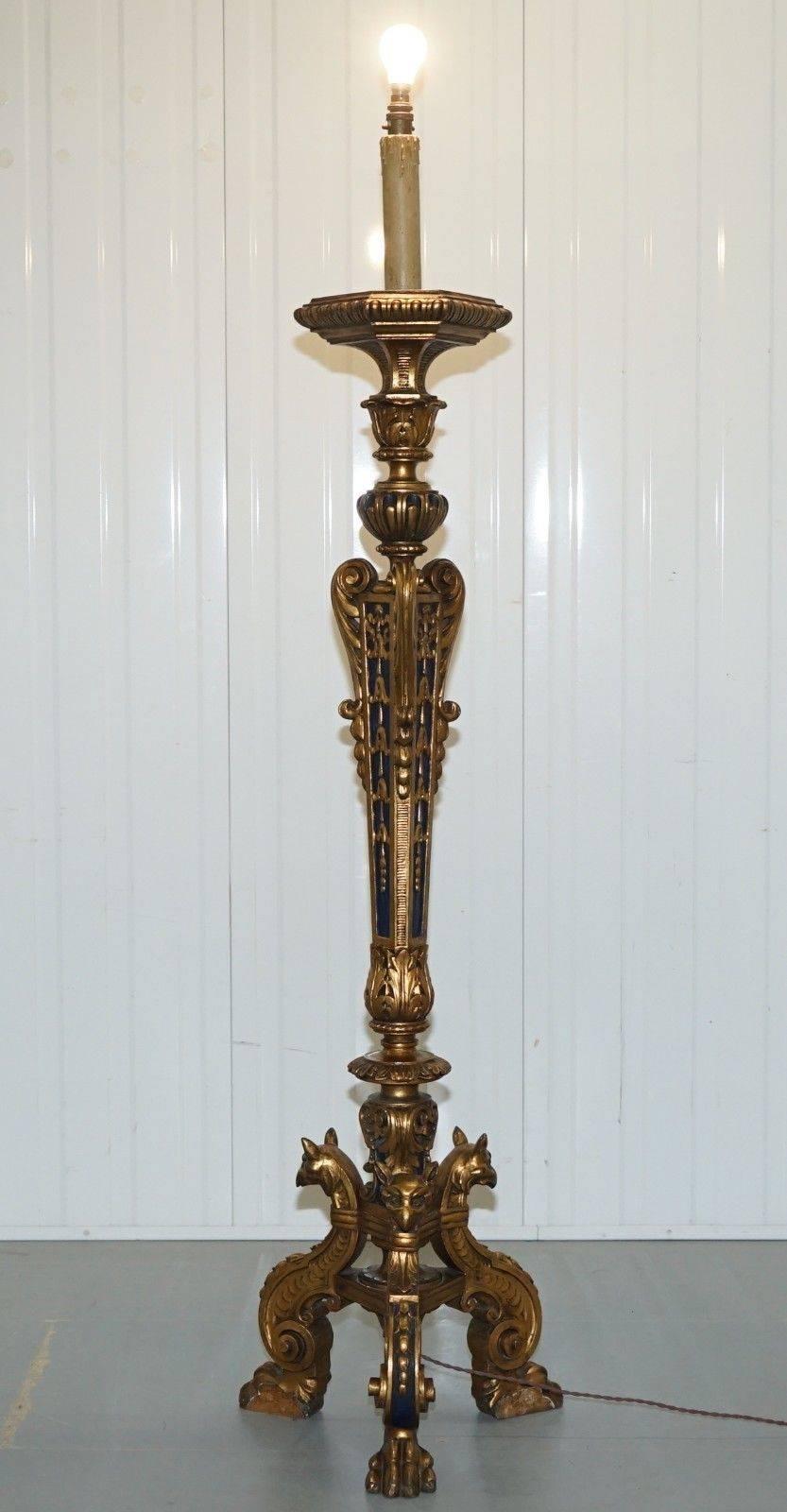 We are delighted to offer for sale this absolutely stunning French 19th century gilt wood carved column lamp with gold leaf and Napoleonic blue paint

The lamp is stunning, It has lion hairy paw feet and a hawk-like bird head on each leg, the