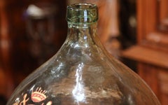 French Hand Blown Demijohn Glass Bottle with Painted and Gilt Coat of Arms