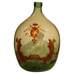French Hand Blown Demijohn Glass Bottle with Painted and Gilt Coat of Arms