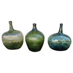French Three Hand Blown Onion Bulbous Neck Colored Glass Wine Jugs, Circa 1850