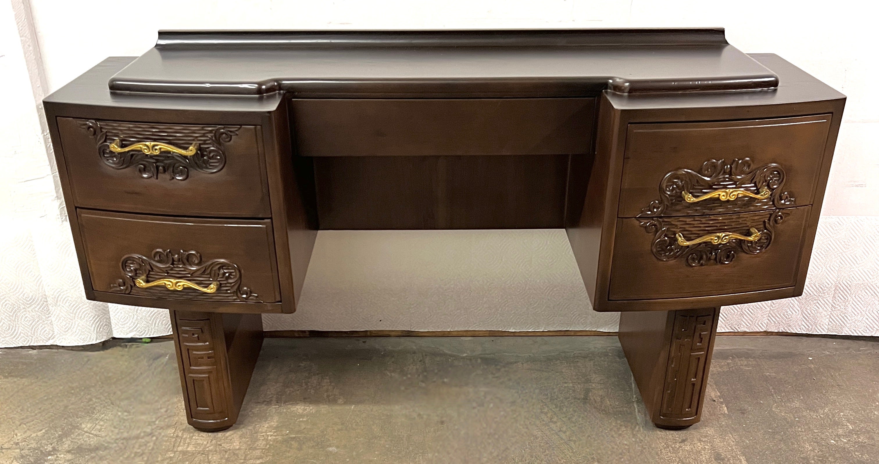 Walnut 5 Drawer French Vanity in the Style of Charles Dudouyt.  

A compliment to many spaces, the dressing room, bedroom, guest room and, in some spaces, could work as an entry or hallway table

This stunning vanity features hand carved drawers, in