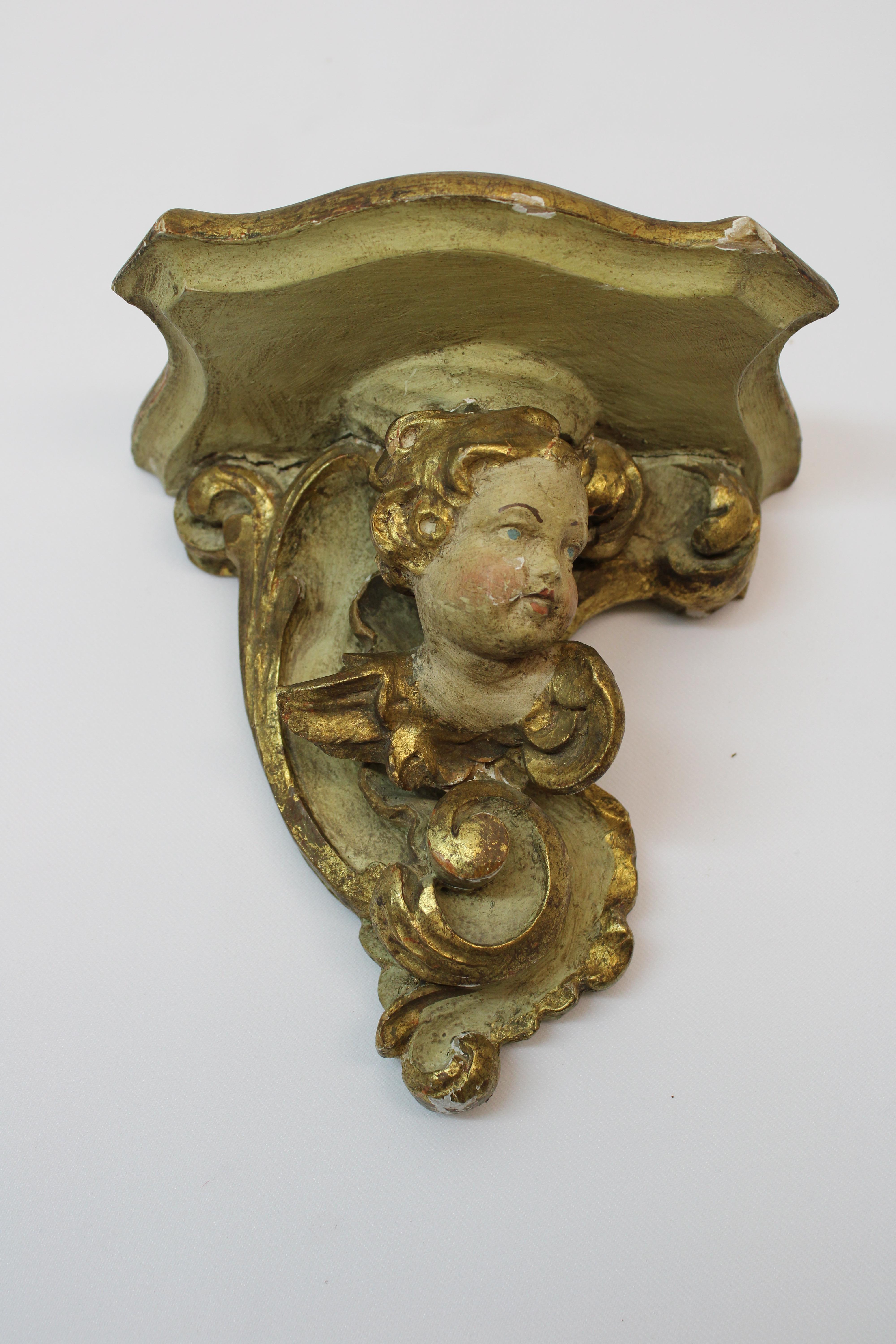 C. 19th century adorable French hand carved putti wall shelves.