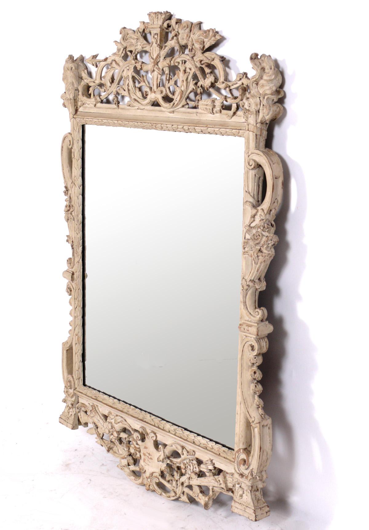 French hand carved tan and white wash finished mirror, believed to be at least circa 1940s, possibly much earlier. It measures an impressive 48