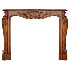 Antique French Hand-Carved Walnut Fireplace
