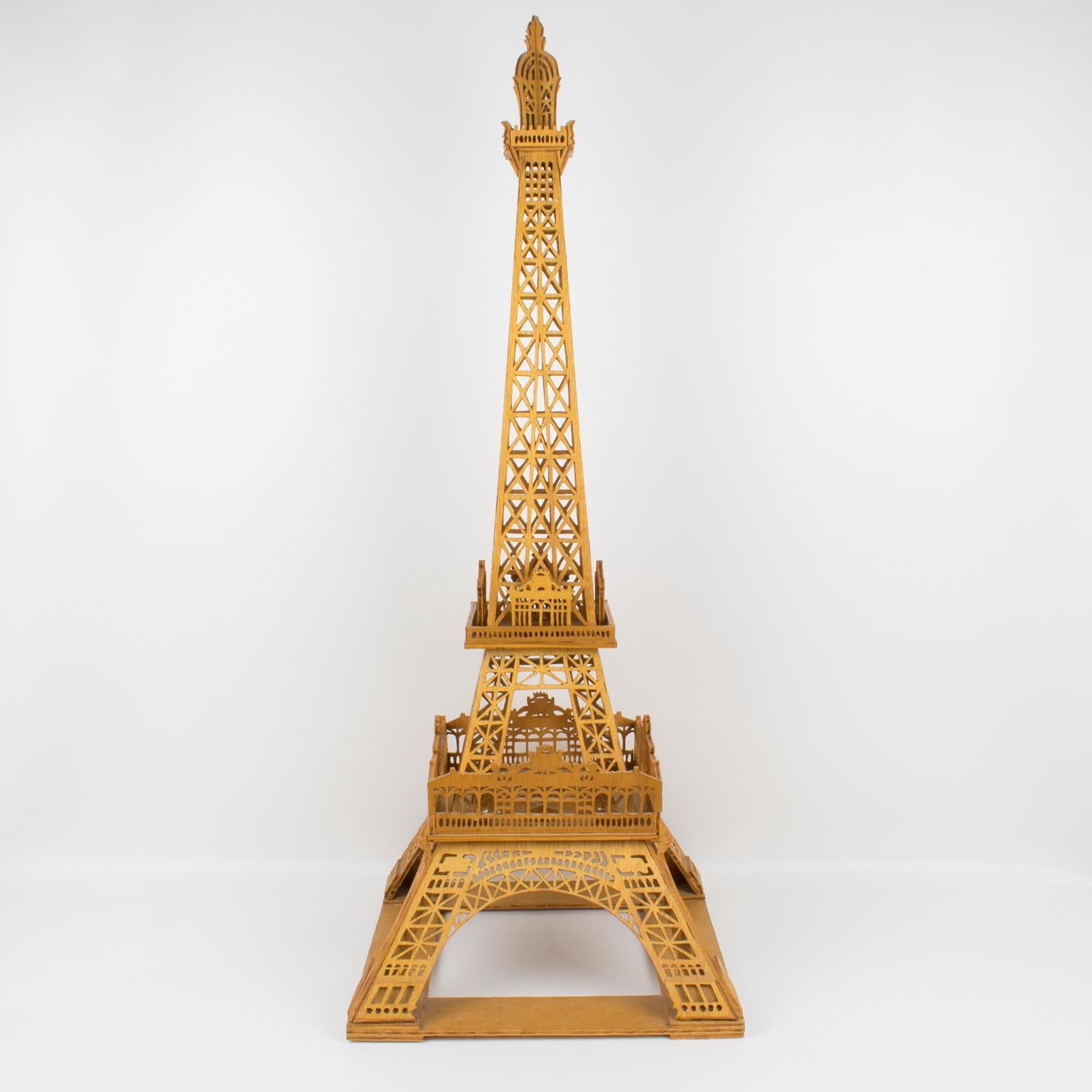 This very decorative model features the iconic Eiffel Tower crafted out of plywood. The architectural models were made by apprentices or master craftsmen to apply for a title by their respective guild.
The Eiffel Tower was built by Gustave Eiffel