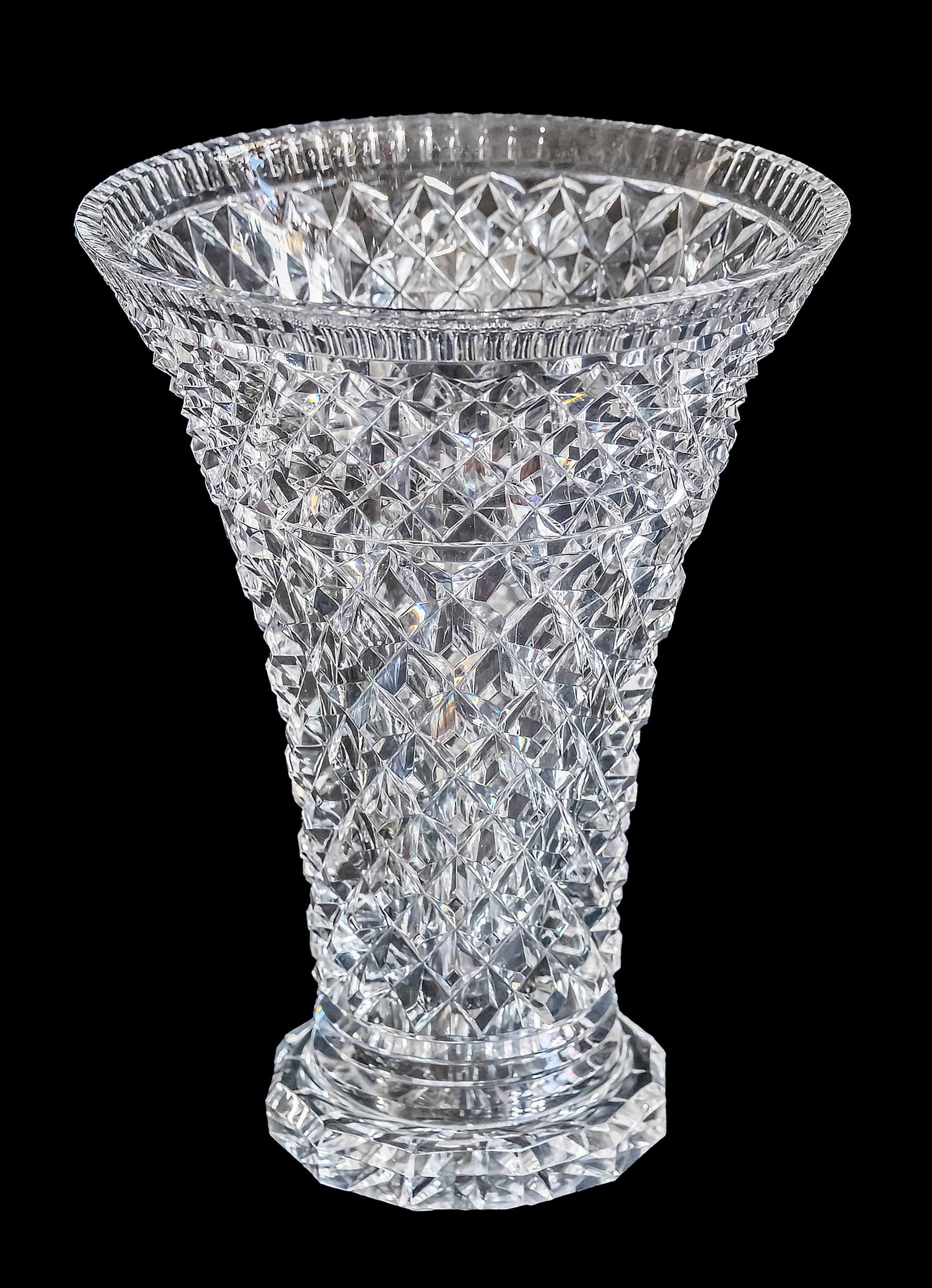 Vintage French large and heavy cut crystal vase.
The crystal is very clear and gives off a bright sound.
 