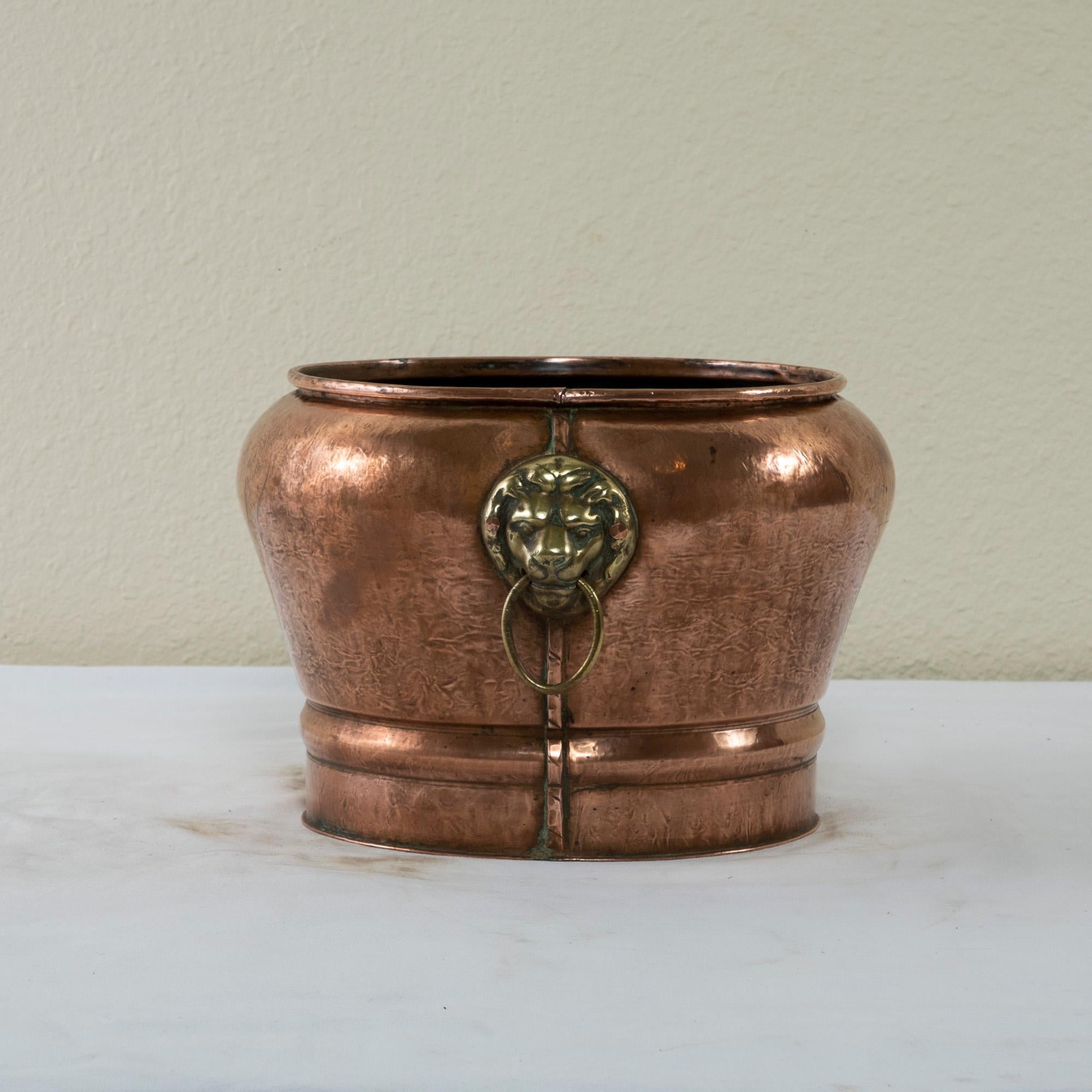 Bronze French Hand Hammered Copper Cachepot or Planter with Lion Heads, c. 1900