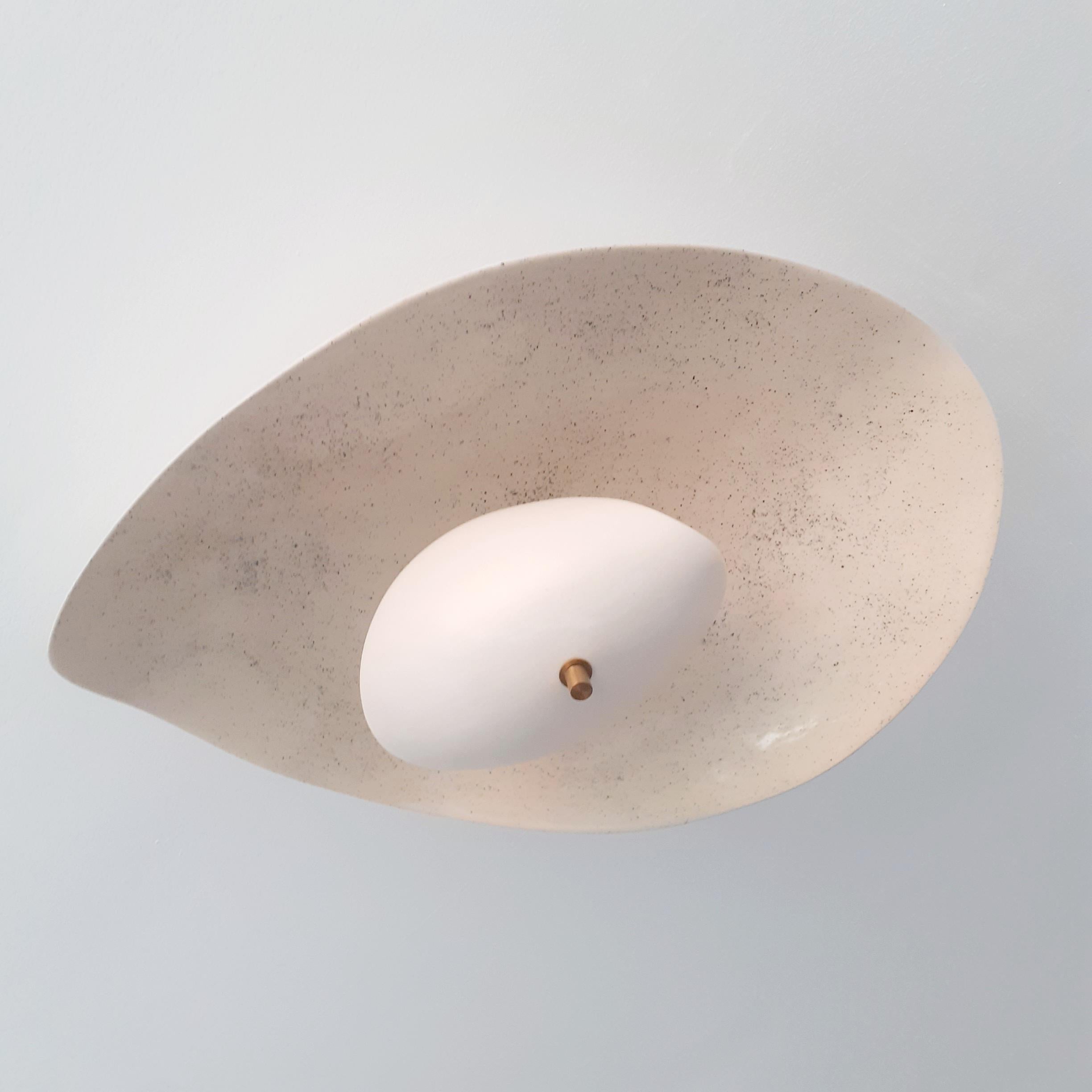 Ceramic ceiling light with airy design.
Brass structure and enameled ceramic handmade in Parisian worksop by Elsa Foulon Studio.
Custom-made on request.