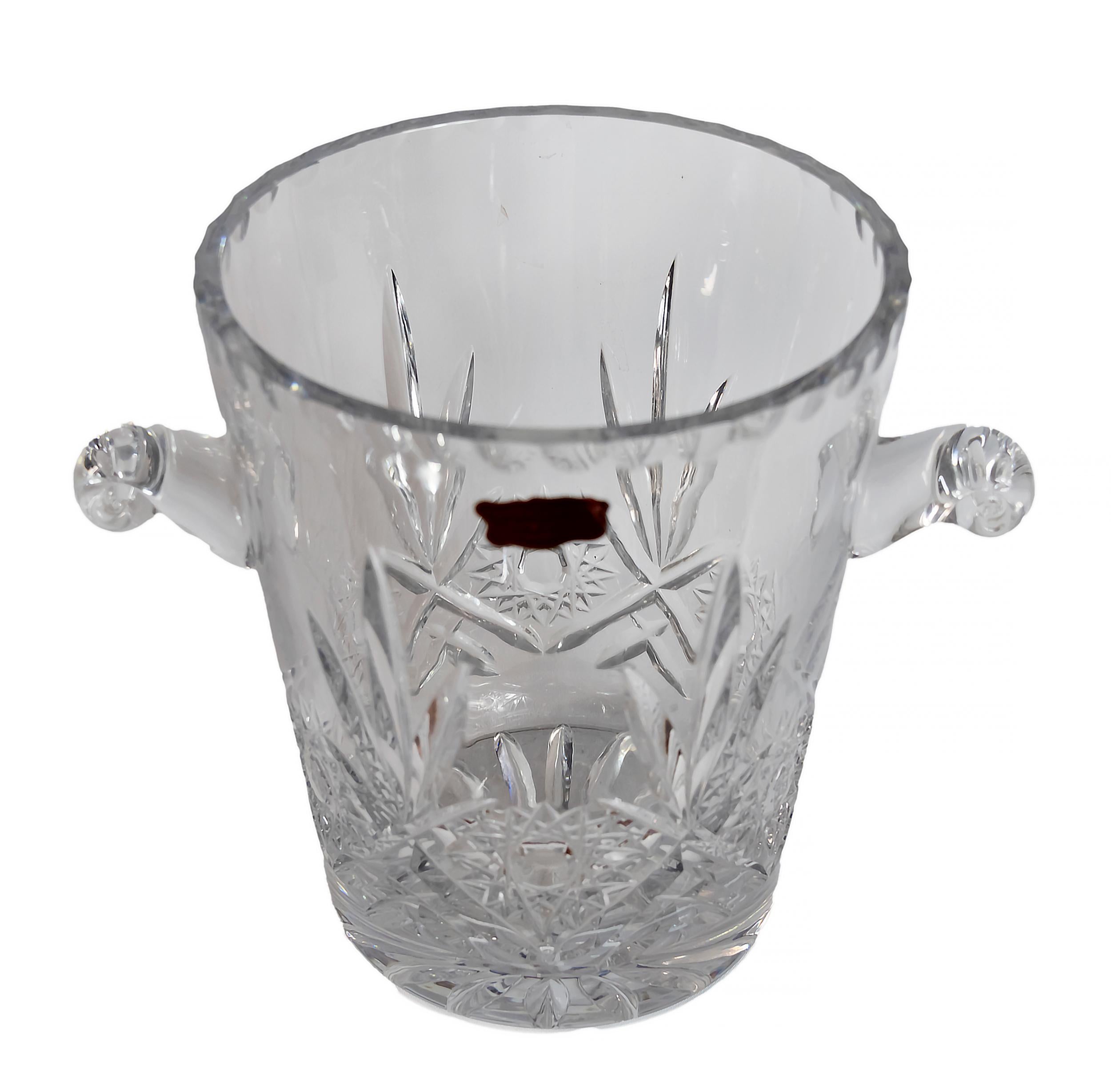 French hand made cut crystal champagne bucket with handles, label and engraved mark on the base.
Very heavy and solid.
 