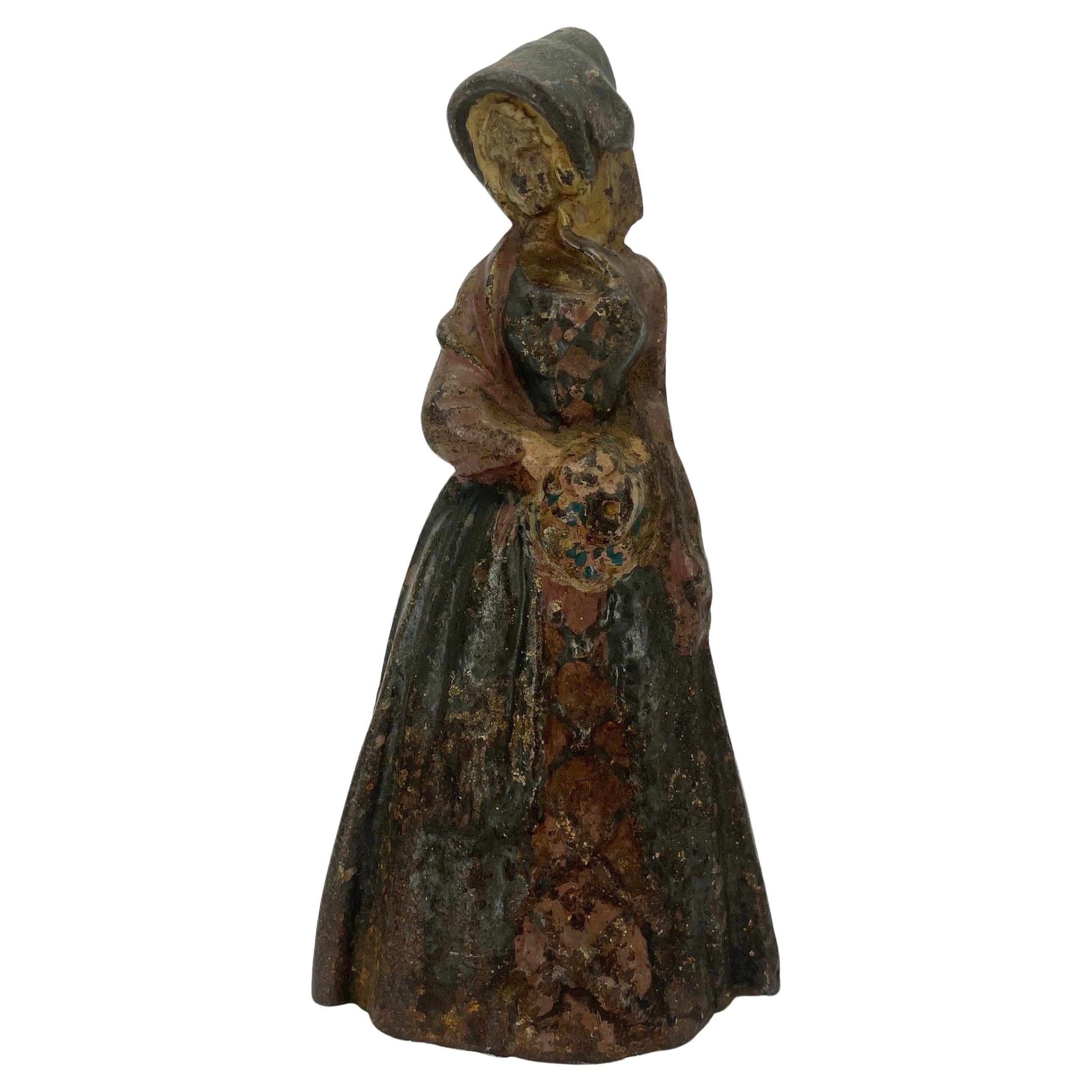 Late 19th century door stop, France, circa 1880.
This lady sculpture is made in heavy solid cast iron and is in it original hand-painted colors.