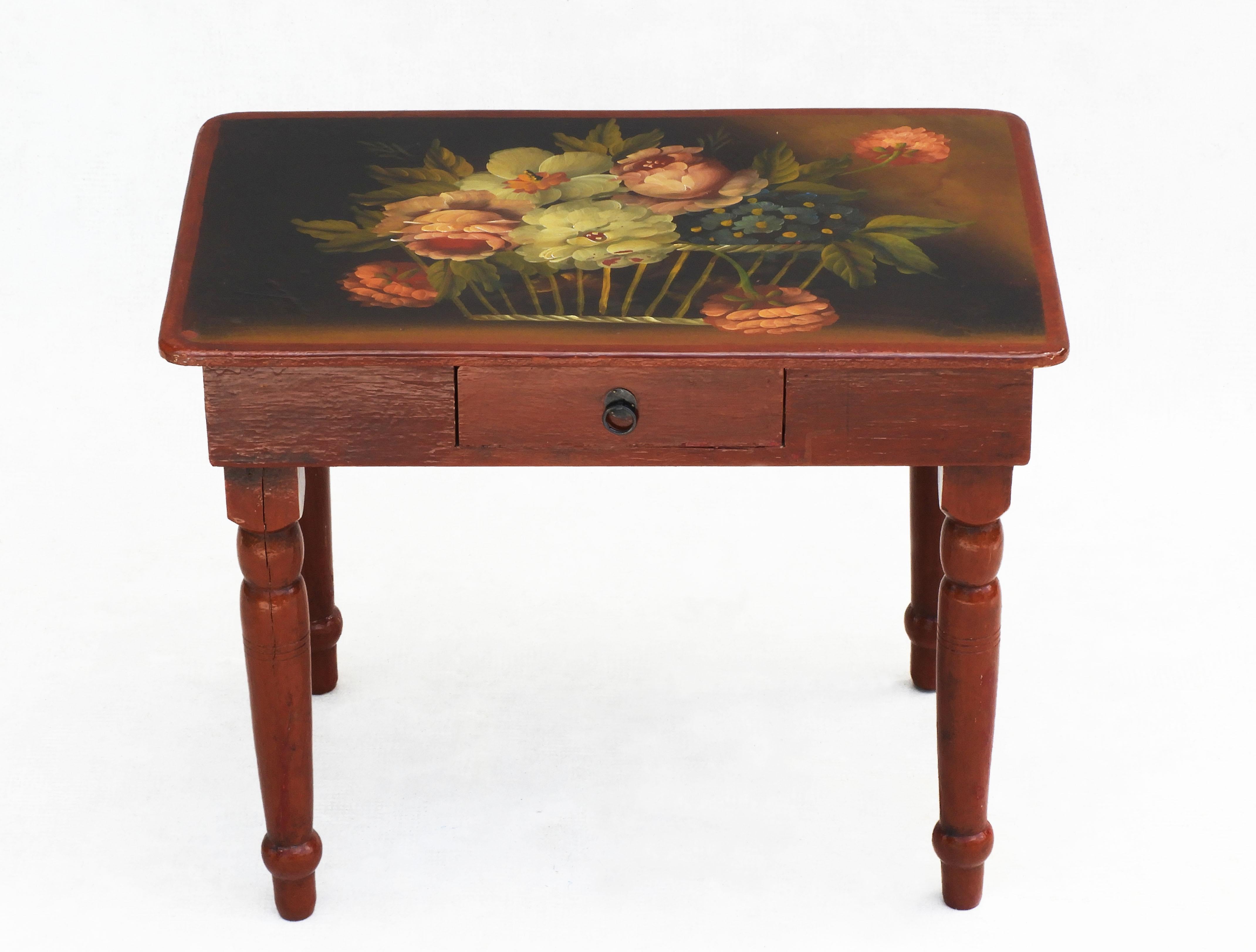 Vintage Folk Art hand-painted table C1940s France.
Charming French wooden side table beautifully decorated with a floral arrangement. A lovely example of early 20th century French 'Arte Populaire', perfect as a side table next to an armchair, a