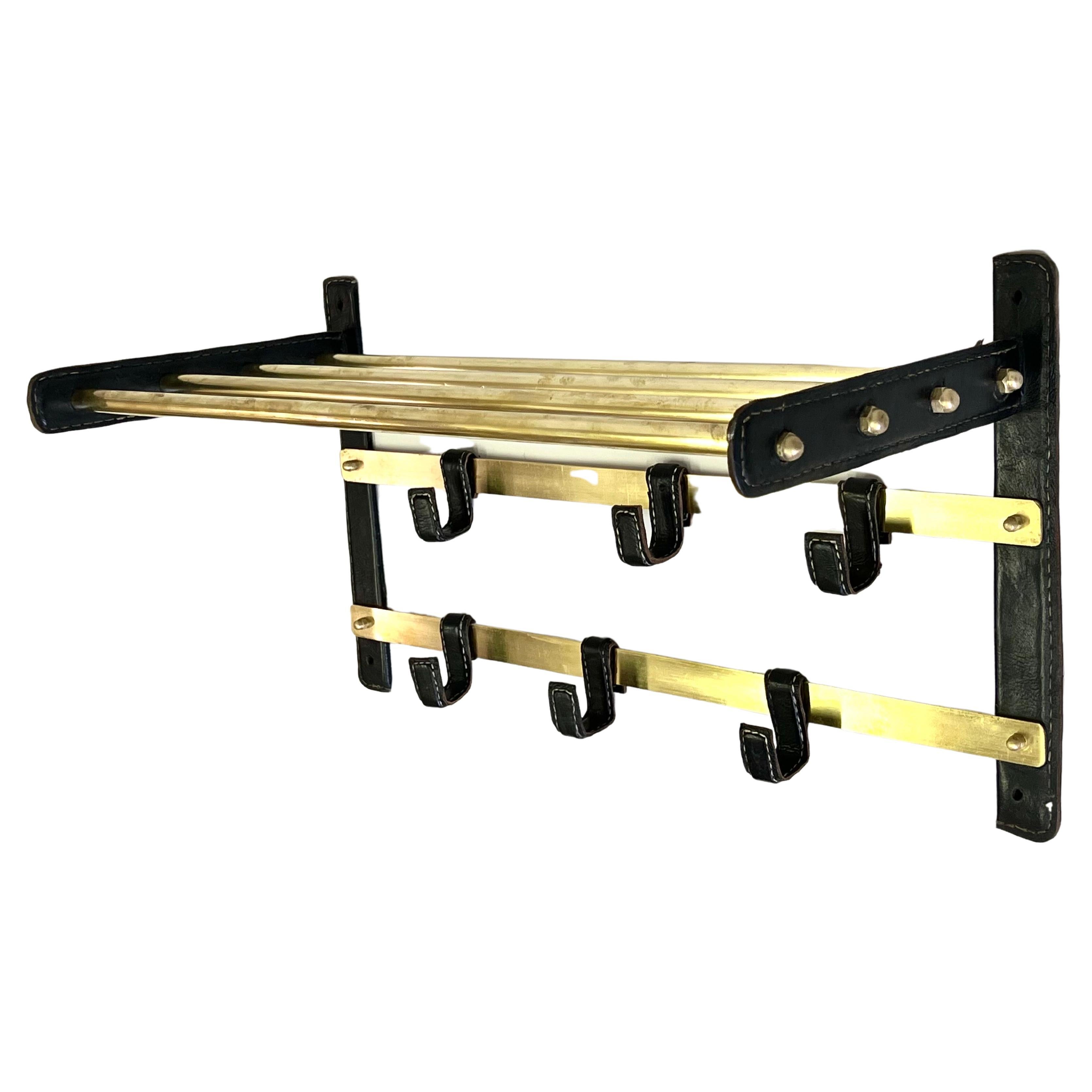 French Hand Stitched Leather & Brass Coat and Hat Rack by Jacques Adnet, 1955  For Sale