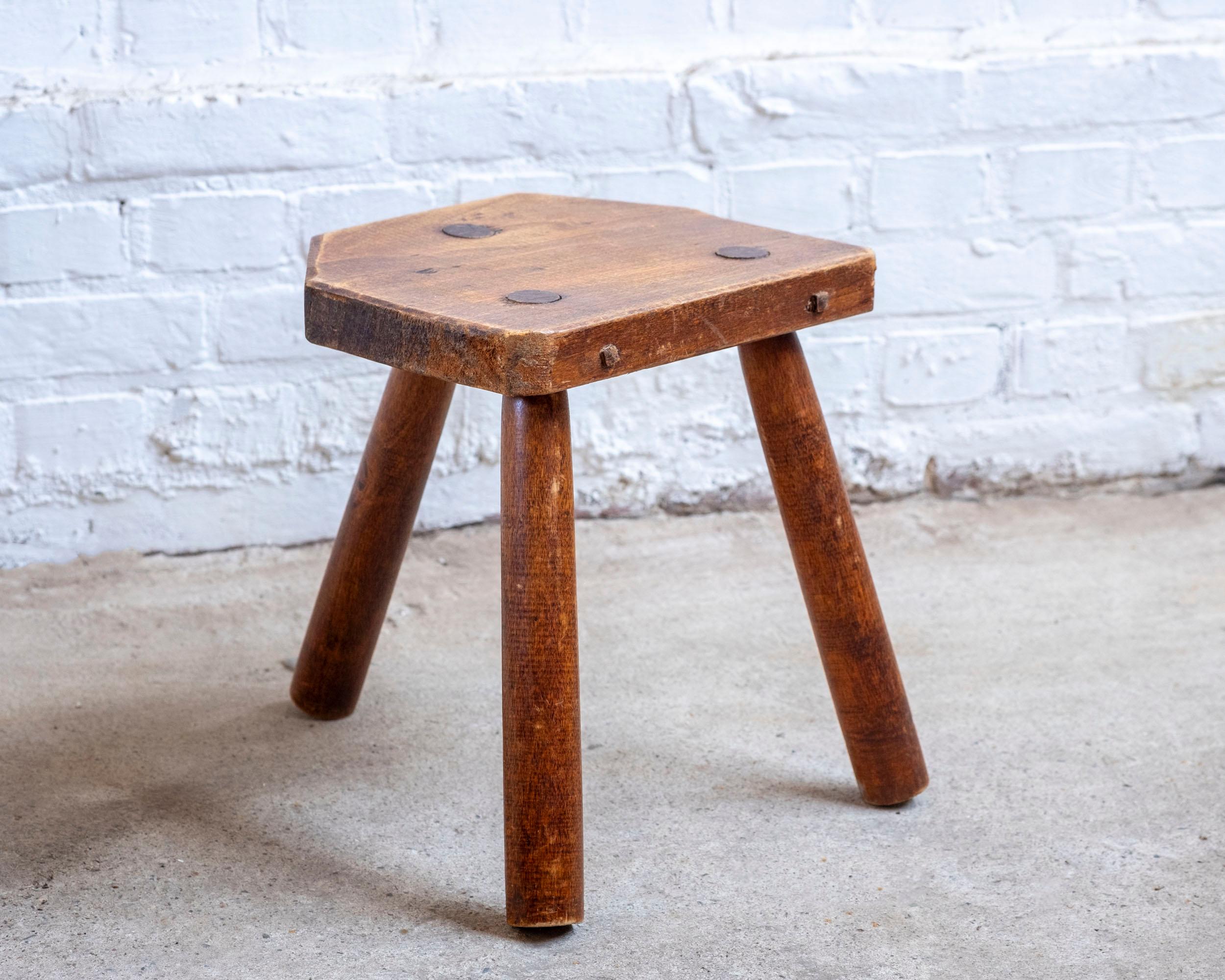 French artisan wooden tripod stool, handcrafted by a French woodworker using traditional woodworking techniques and joinery.
Made from solid wood, this small stool is a timeless piece that can be used either as low stool or side table. The